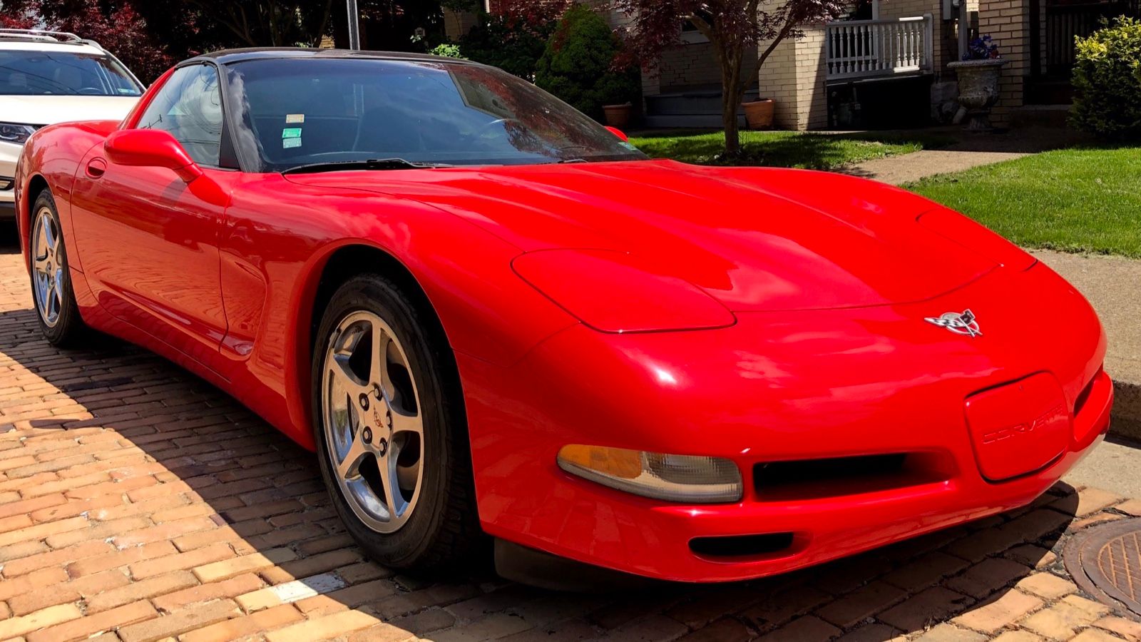 Chevrolet Corvette C5, fifth generation — red coupe, front three-quarter view
