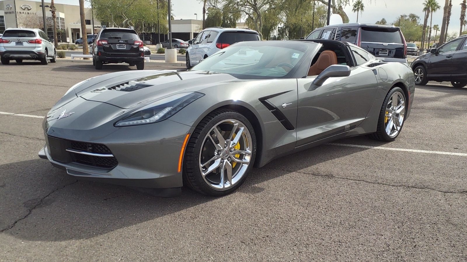 Chevrolet Corvette C7 Stingray, seventh generation — grey coupe, front three-quarter view