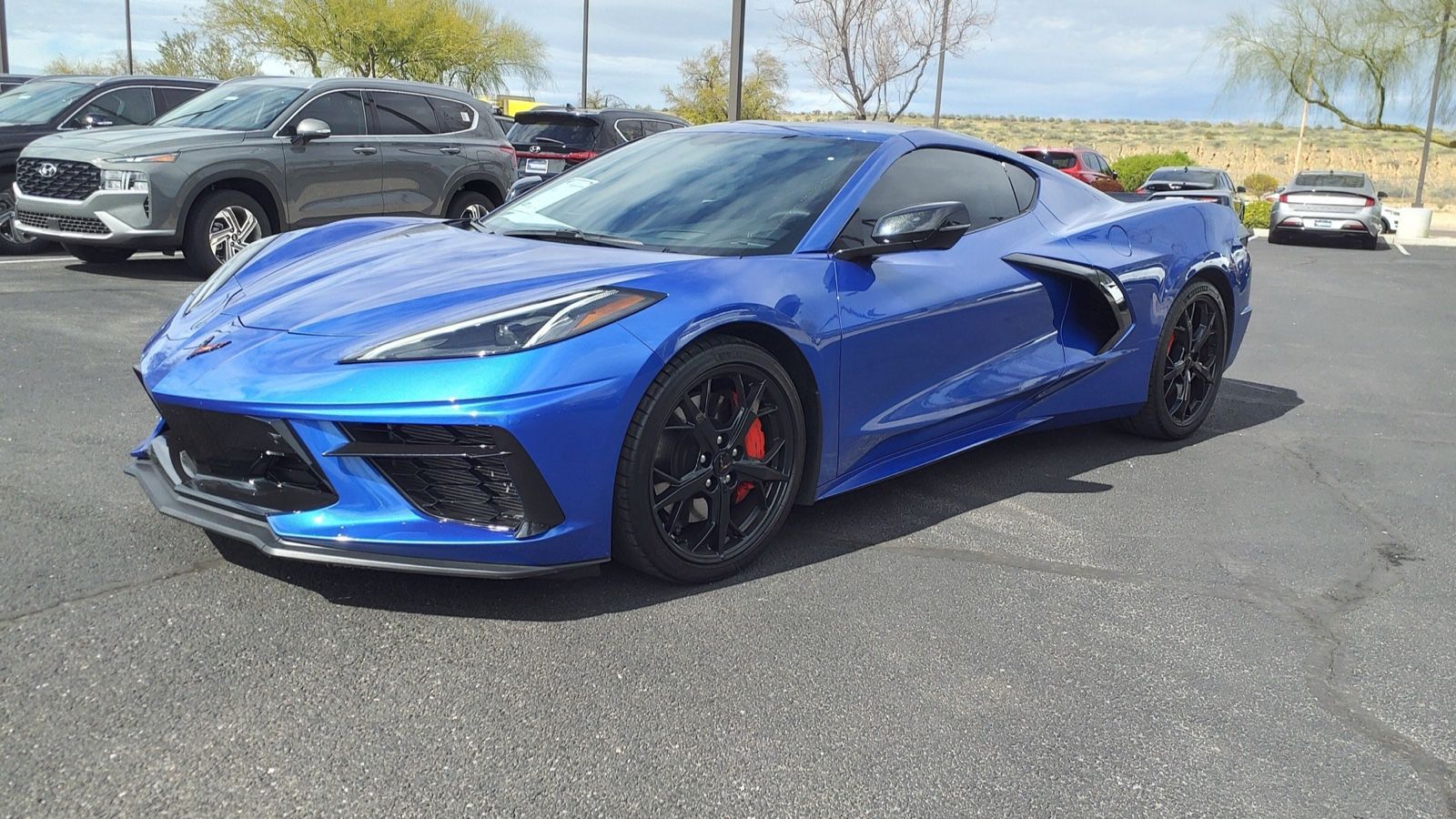 Chevrolet Corvette C8 Stingray, eighth generation — blue coupe, front three-quarter view