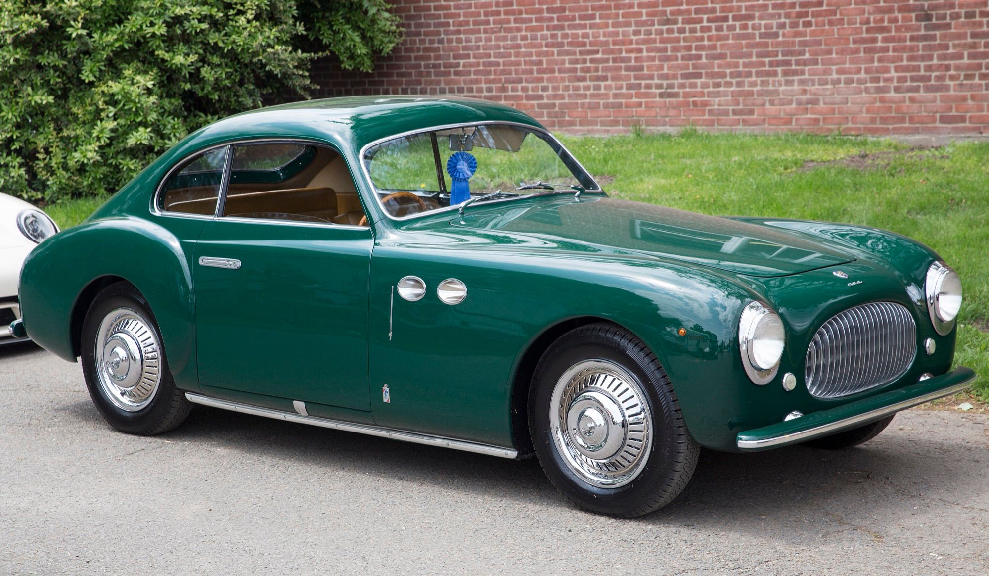 Green Cisitalia 202 coupe, front three-quarter view