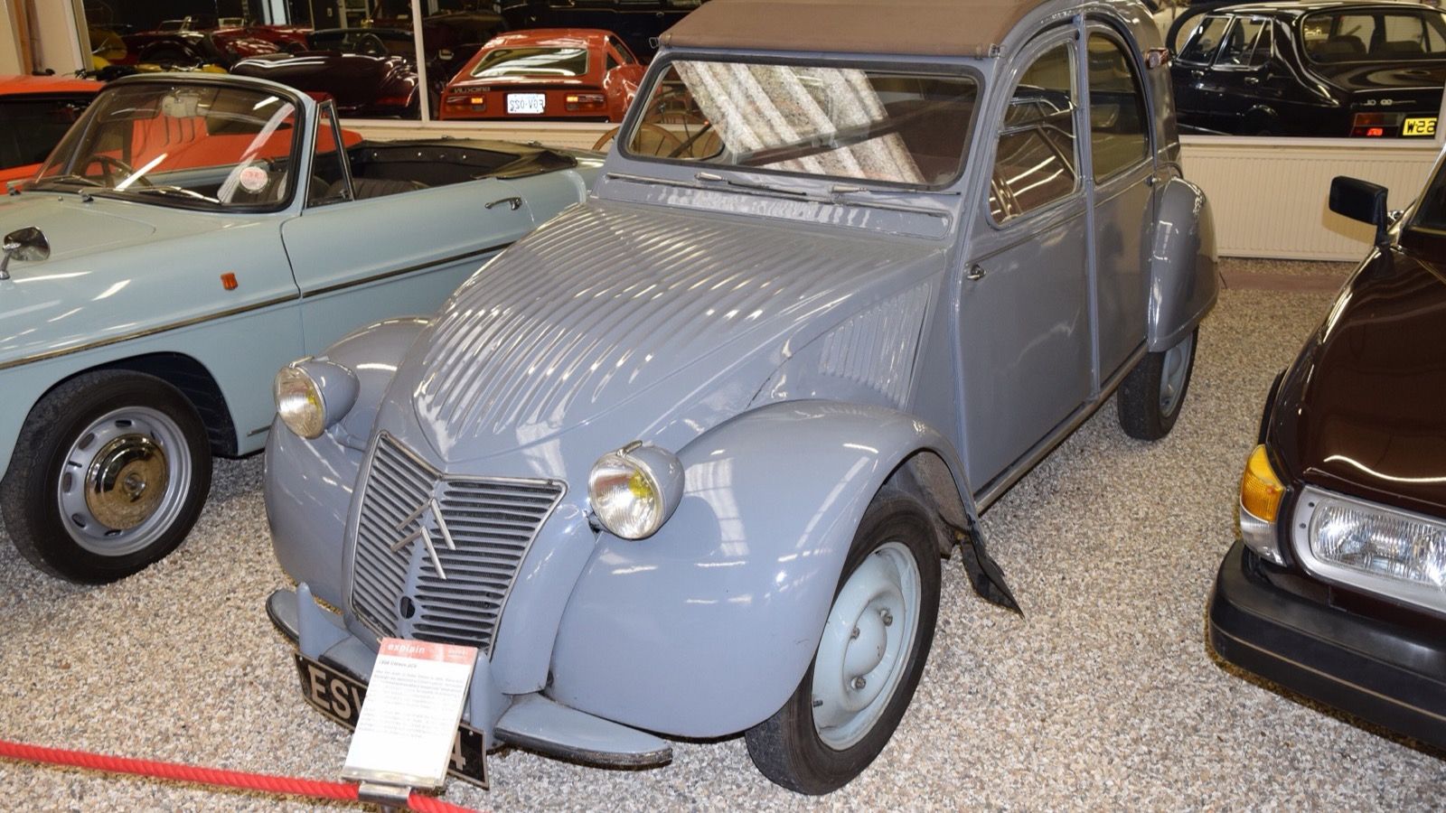 1958 Citroën 2CV with corrugated bonnet and roll-back roof, front three-quarter view