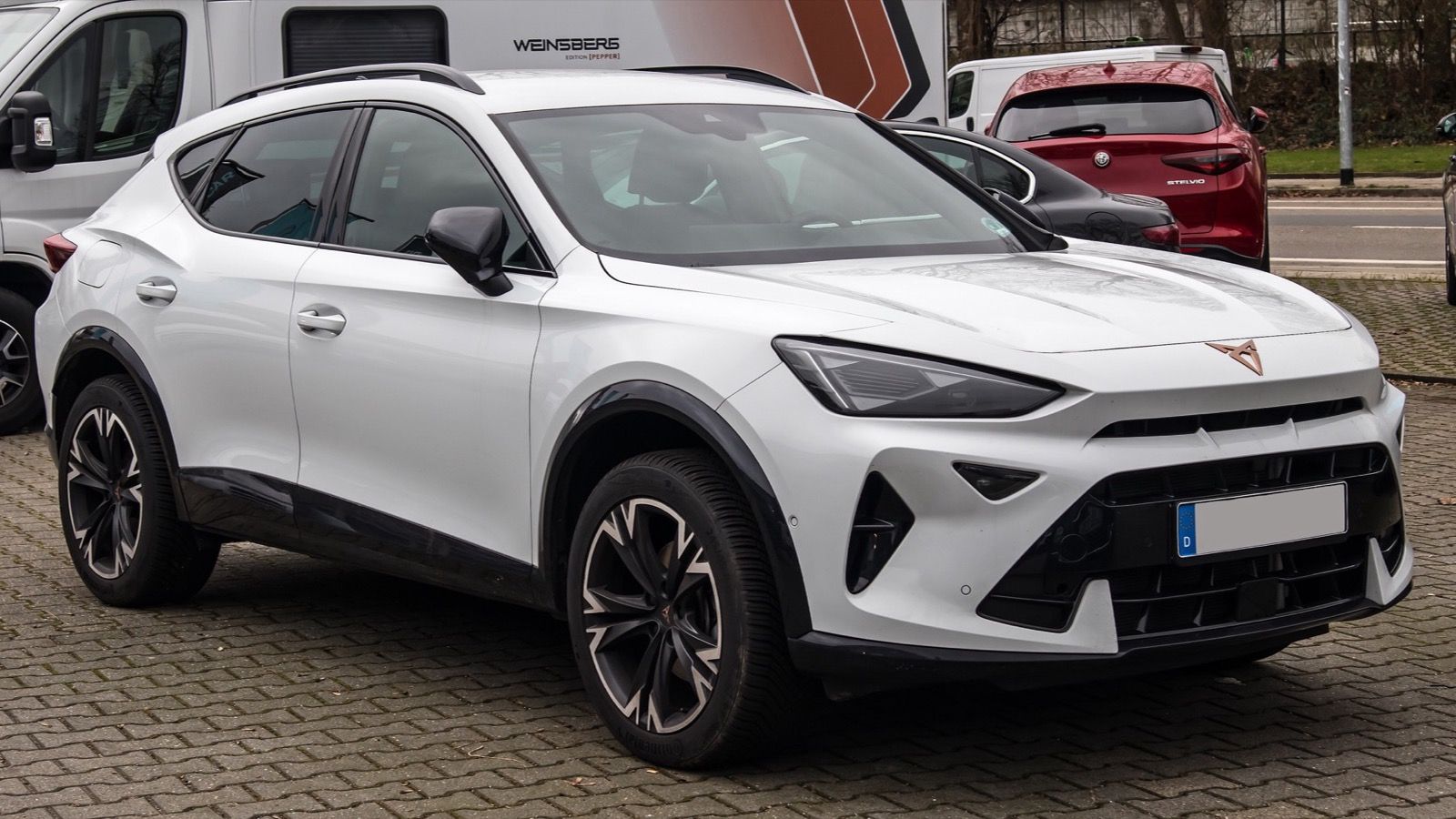 White facelifted 2025 Cupra Formentor, front three-quarter view