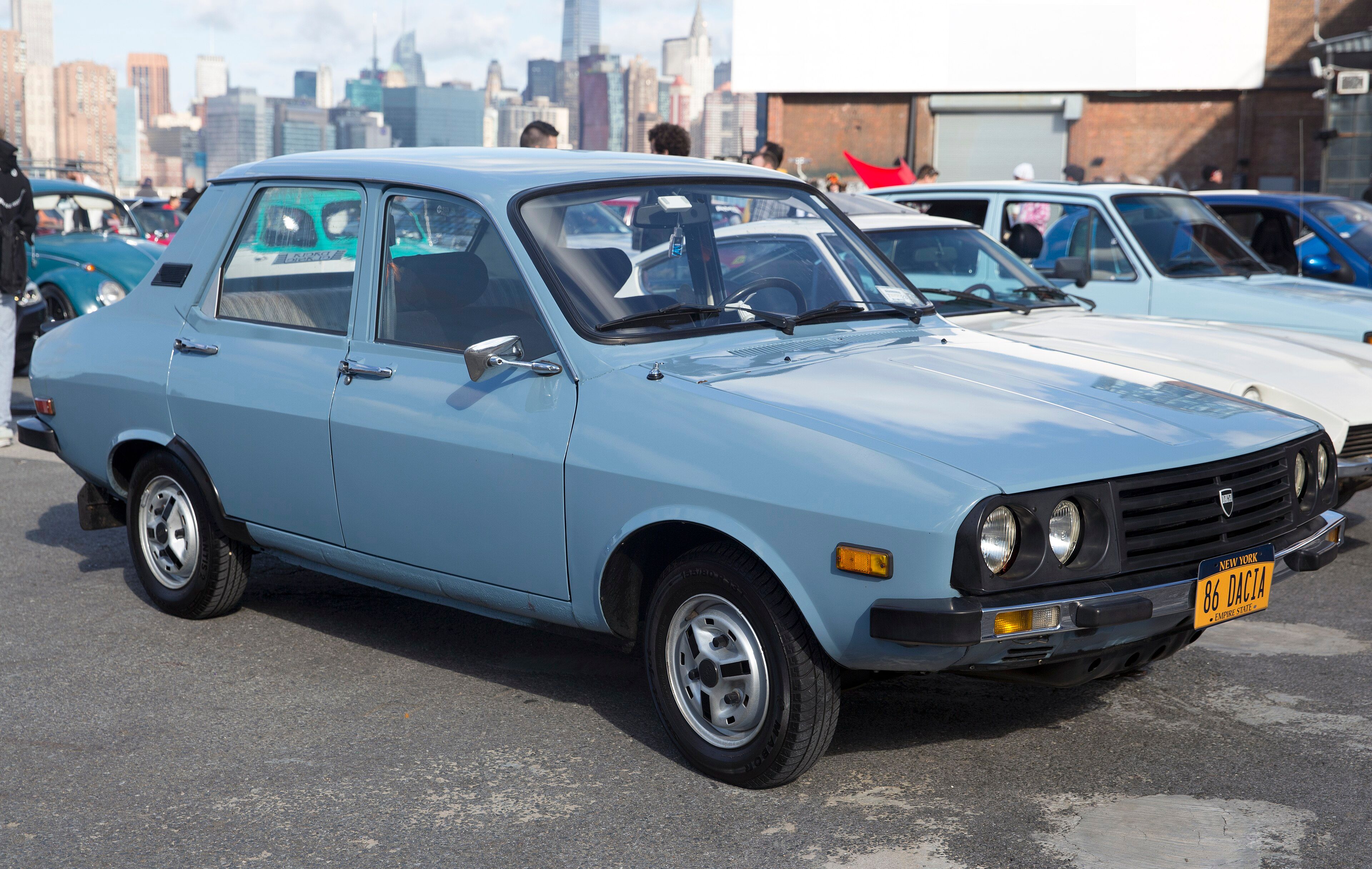 Light blue 1986 Dacia 1310 TLX saloon, front three-quarter view