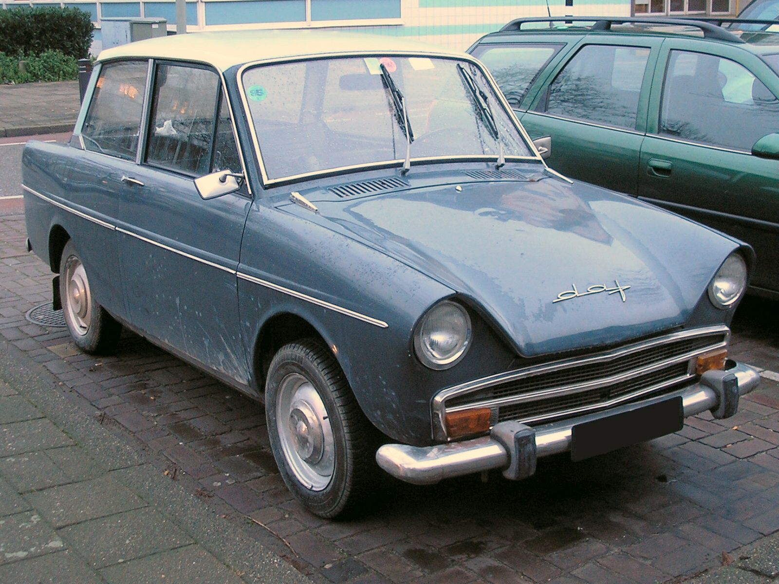 Blue 1965 DAF 31 Daffodil two-door saloon, front three-quarter view