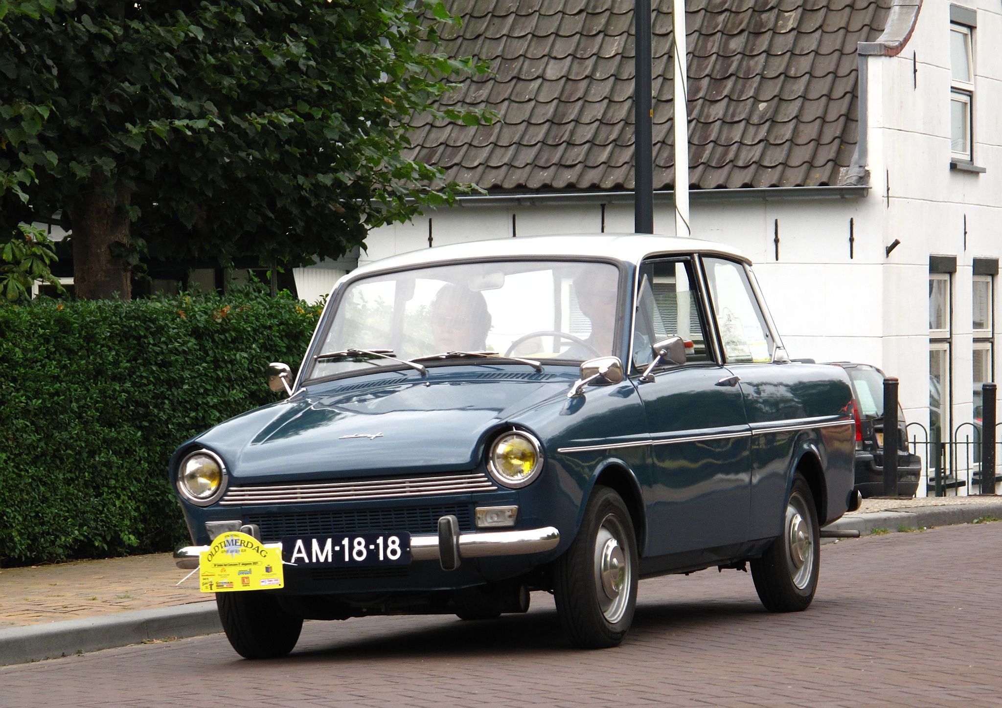 Blue 1966 DAF Daffodil 32 two-door saloon, front three-quarter view