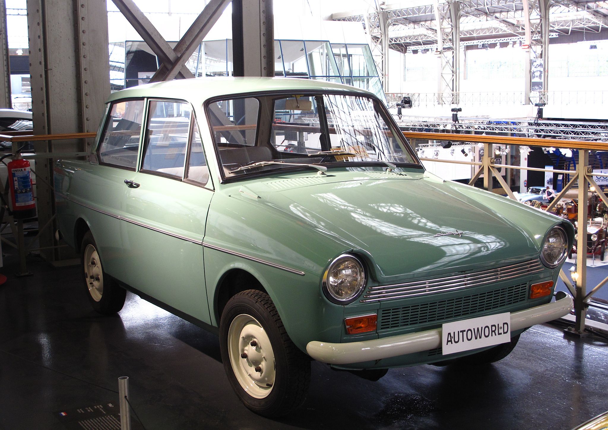 Pale green 1967 DAF Daffodil 32 two-door saloon on museum display, front three-quarter view