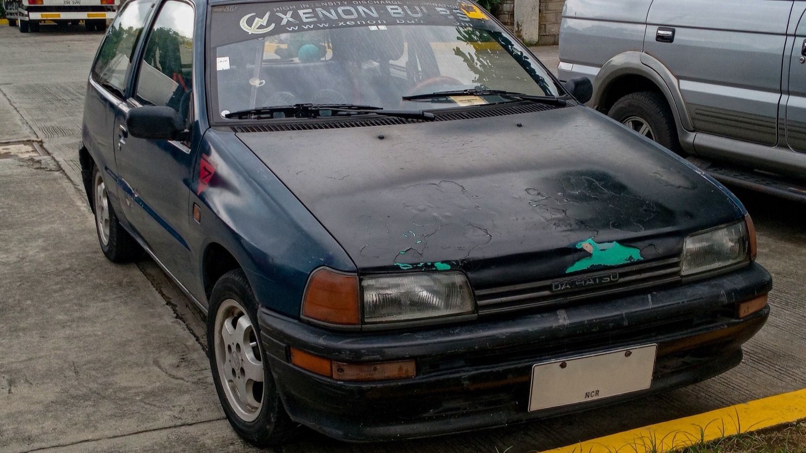 1991 Daihatsu Charade 1.0 TS 3-door, front three-quarter view