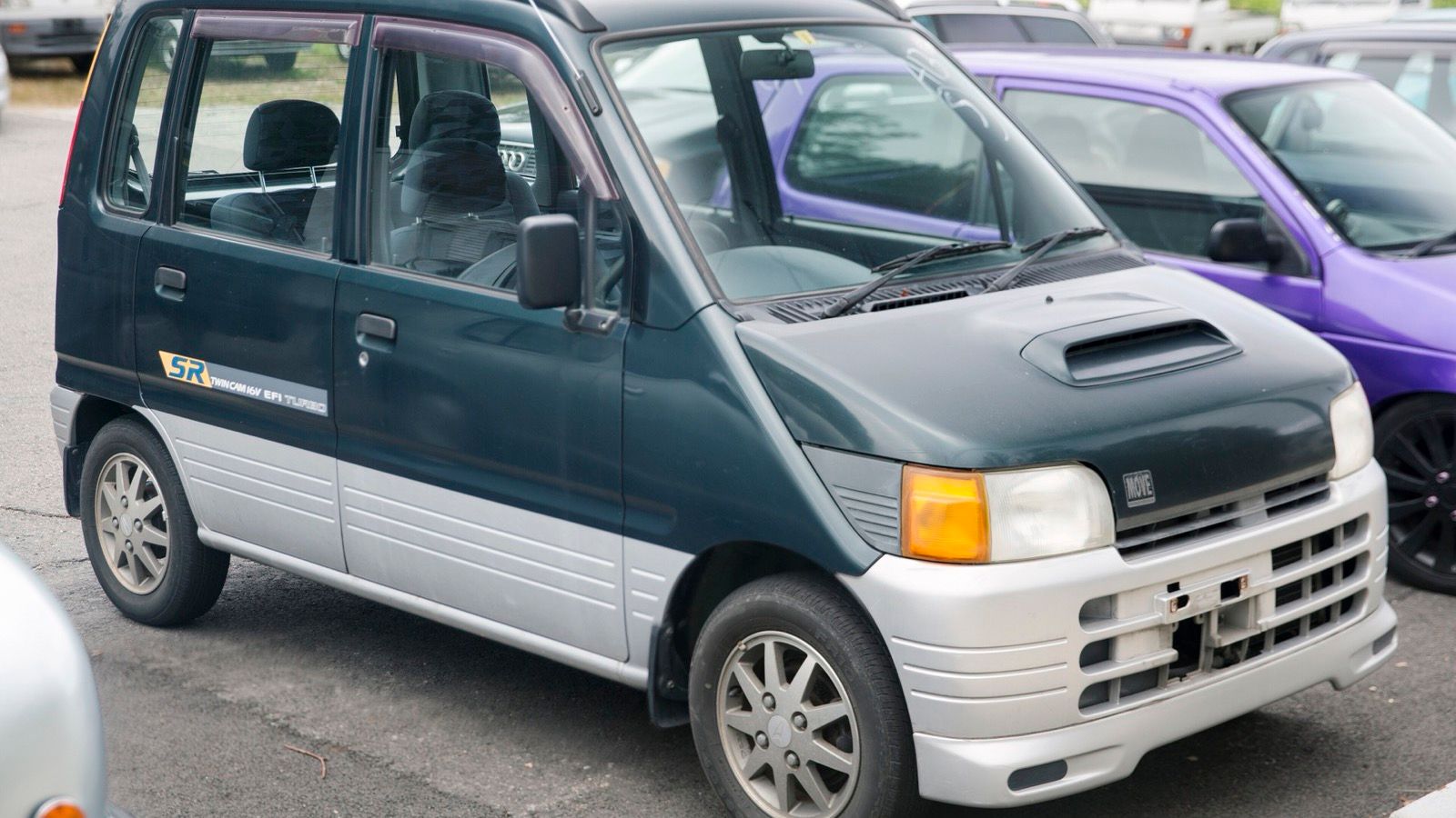 1996 Daihatsu Move SR in Dark Green over Silver, front three-quarter view