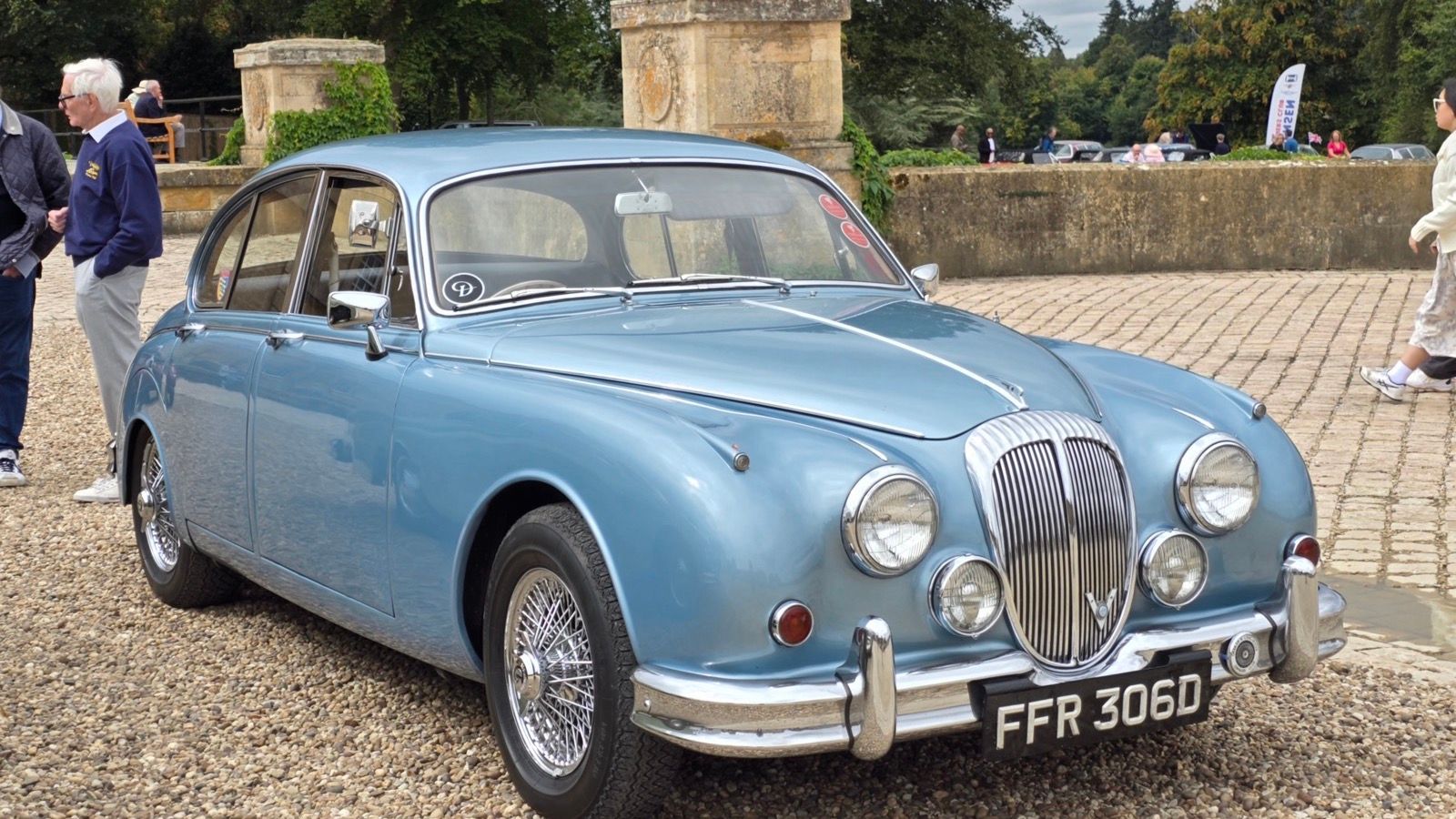 Light blue 1966 Daimler 2.5 V8 saloon with fluted grille, front three-quarter view