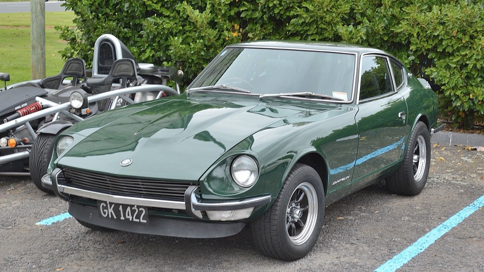 Green 1971 Datsun 240Z, front three-quarter view