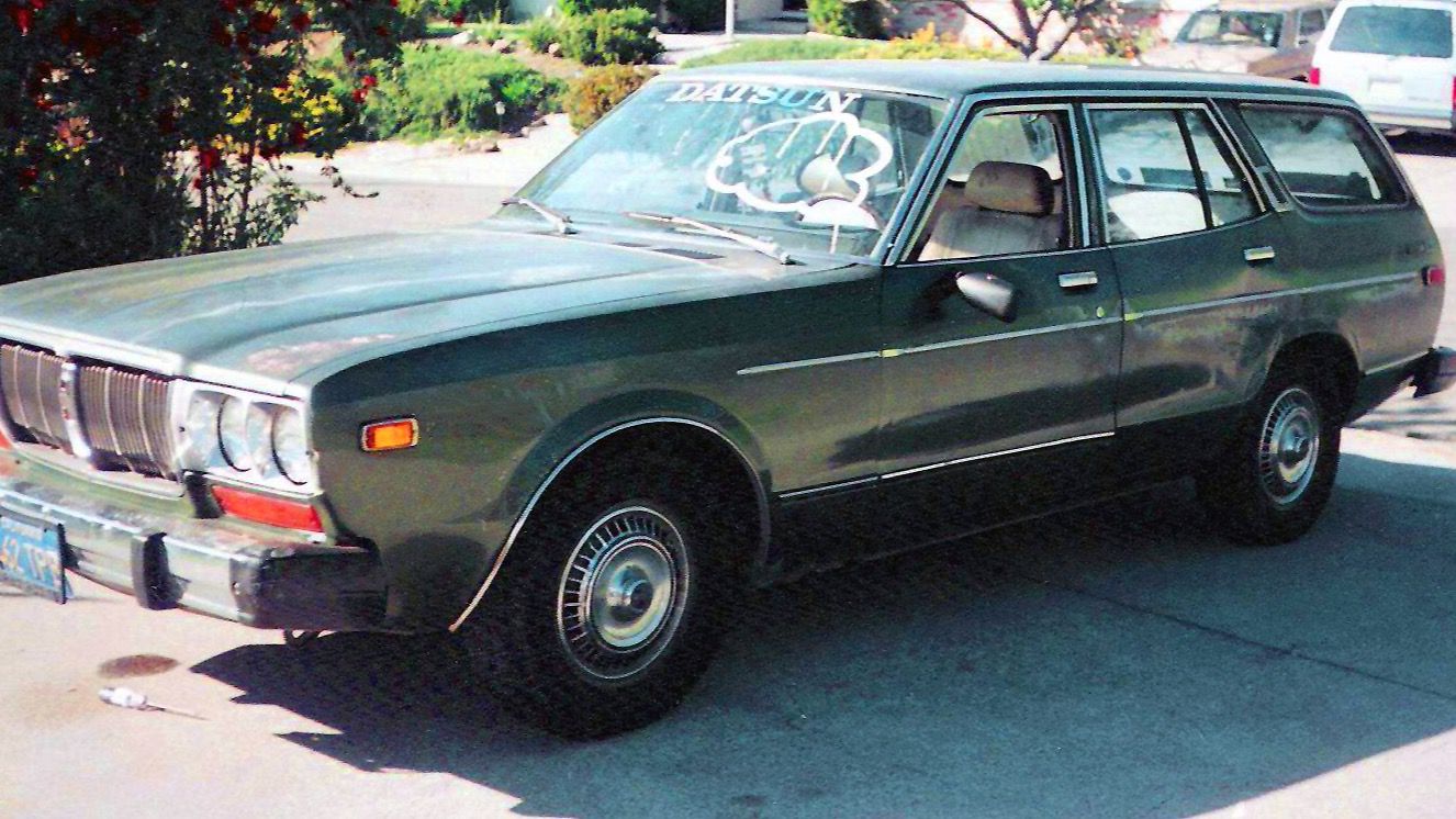 Green 1977 Datsun 810 station wagon, front three-quarter view