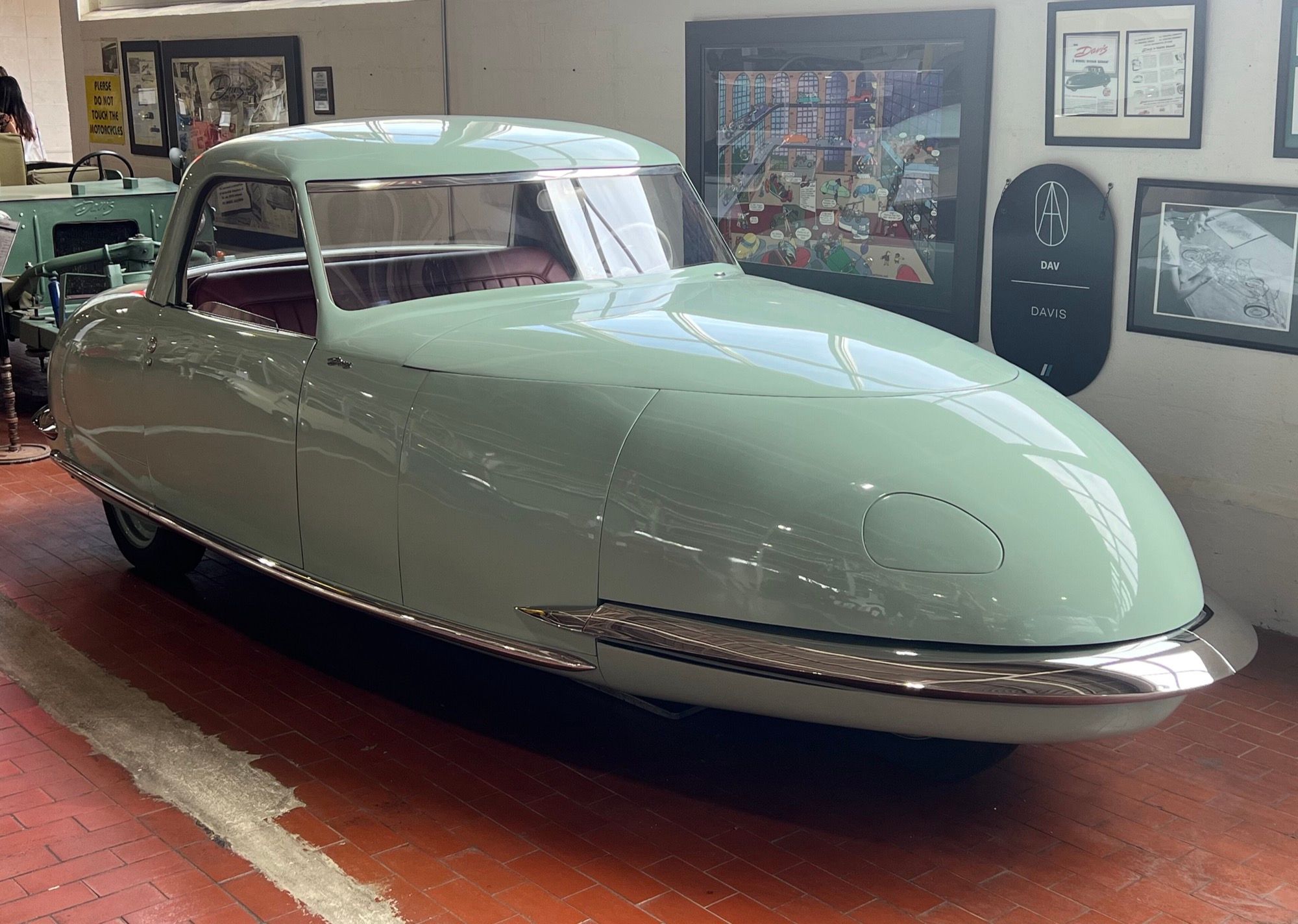 Pale green 1947 Davis Divan 'Baby' three-wheeler with hardtop, front three-quarter view, at the Lane Motor Museum