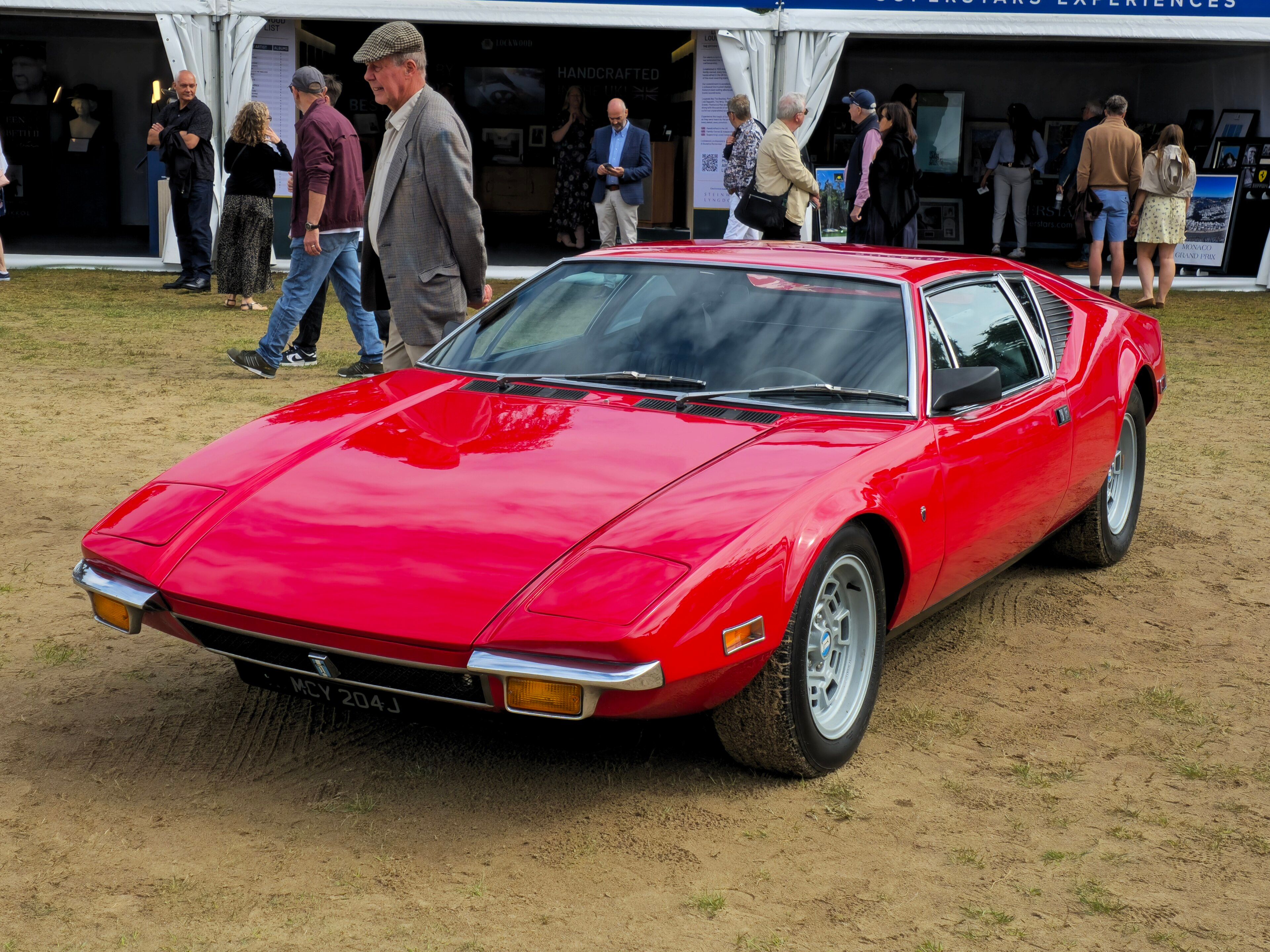 Red 1972 De Tomaso Pantera, front three-quarter view
