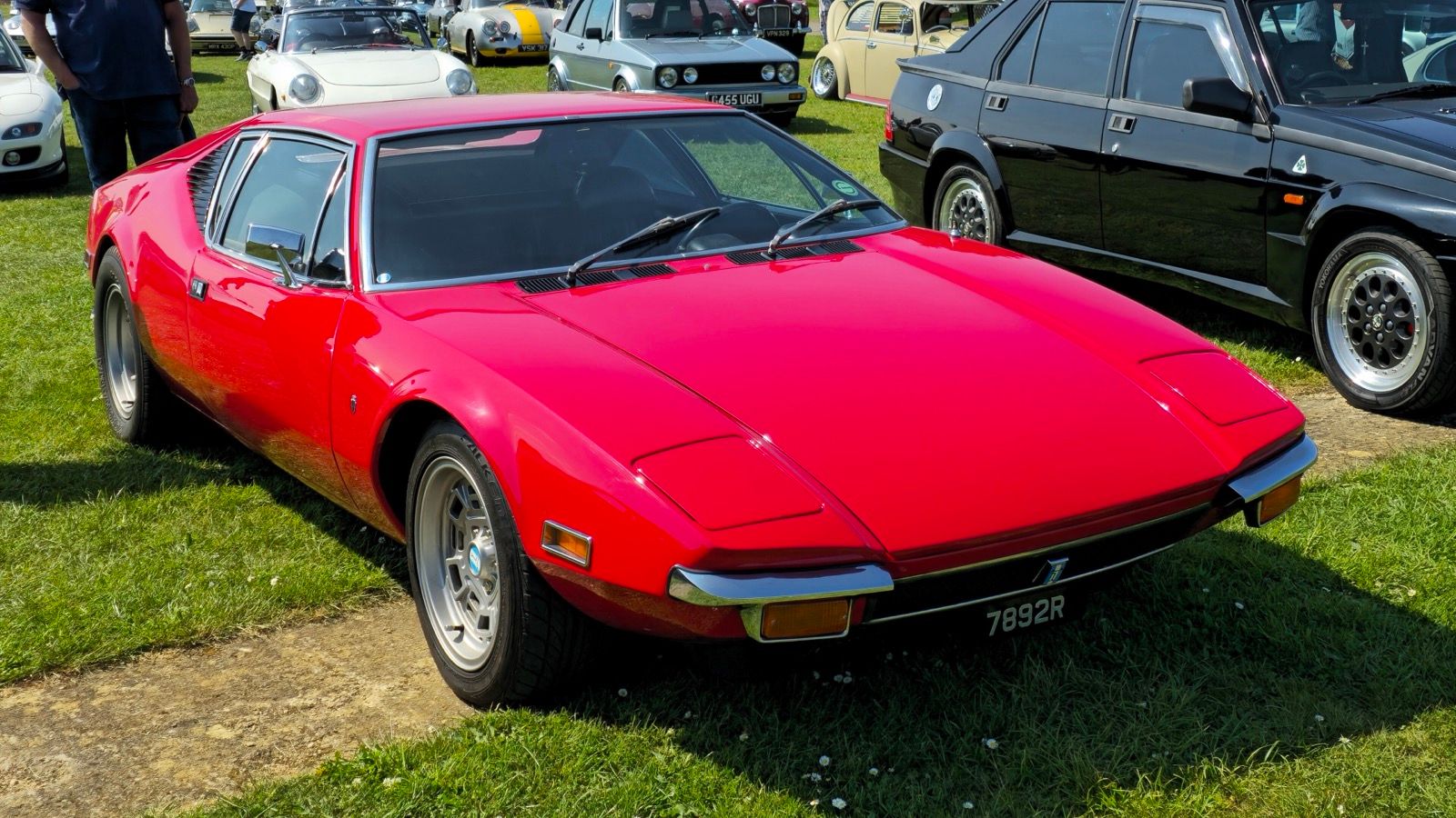 Red 1971 De Tomaso Pantera, front three-quarter view
