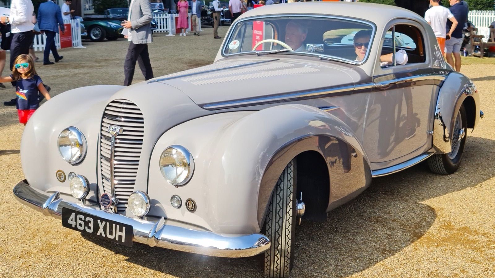 Grey 1948 Delahaye 135 M coupé at a concours, front three-quarter view