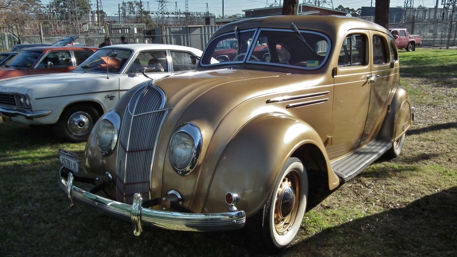 Gold 1935 DeSoto Airflow sedan, front three-quarter view