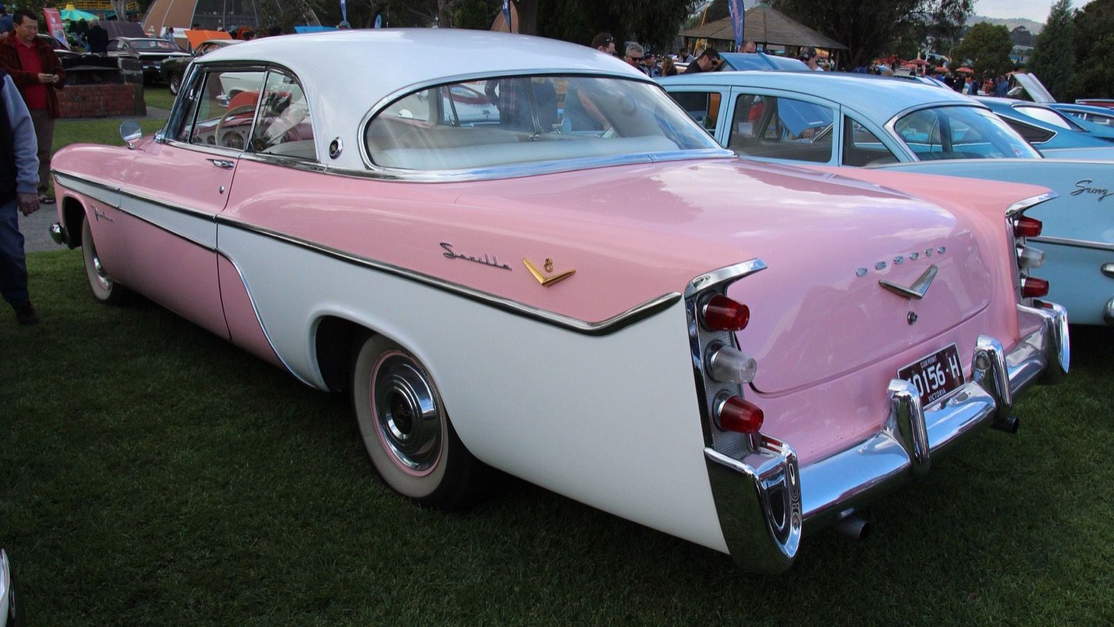 Pink and white 1956 DeSoto Firedome Seville hardtop, rear three-quarter view