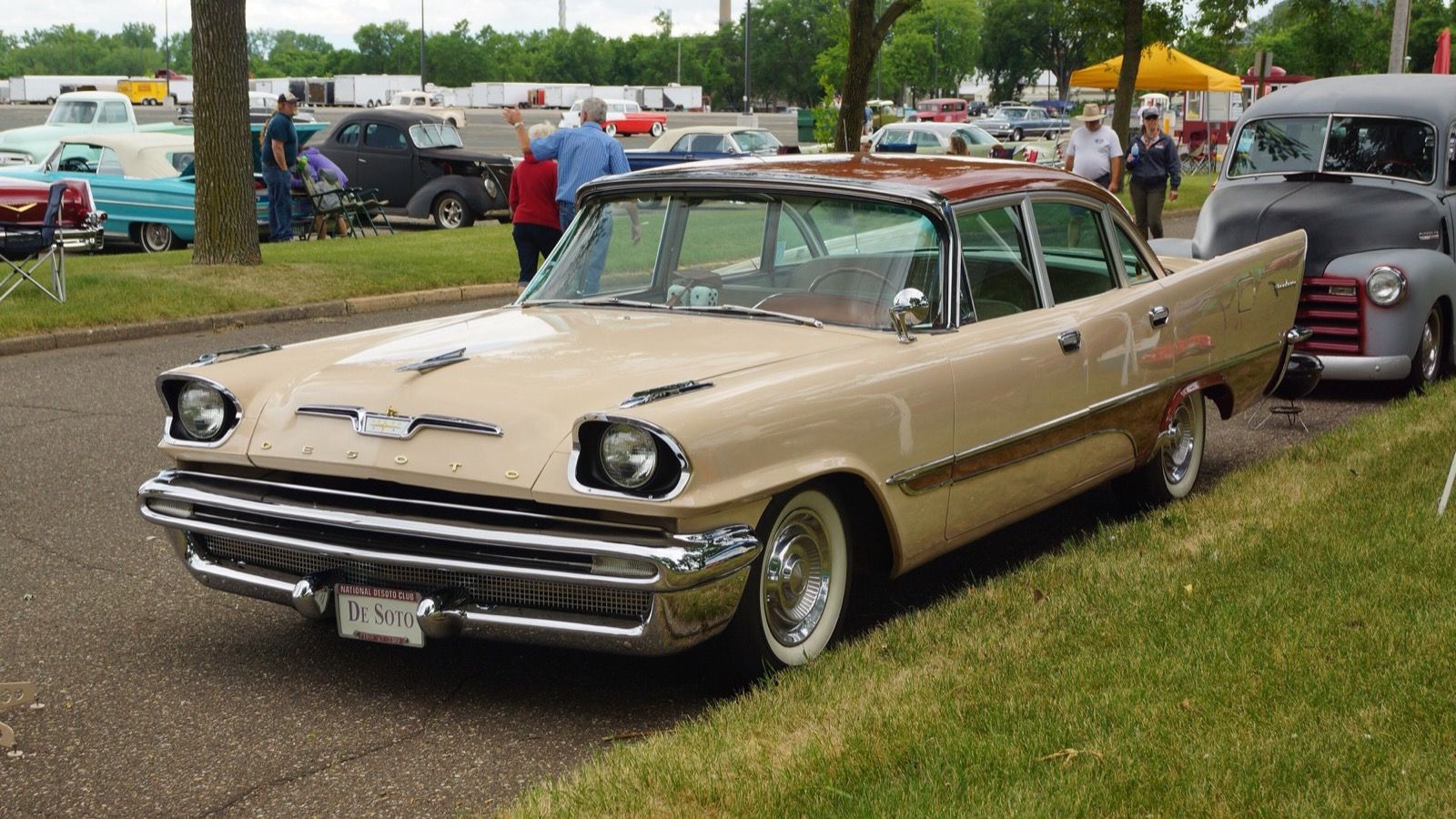 Tan 1957 DeSoto Firedome four-door sedan with tailfins, front three-quarter view