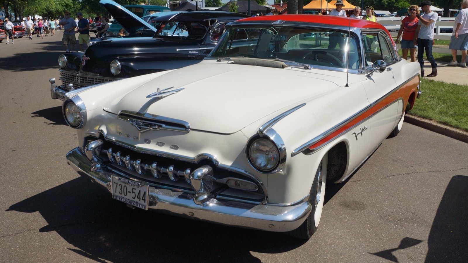 White and orange 1955 DeSoto Fireflite, front three-quarter view