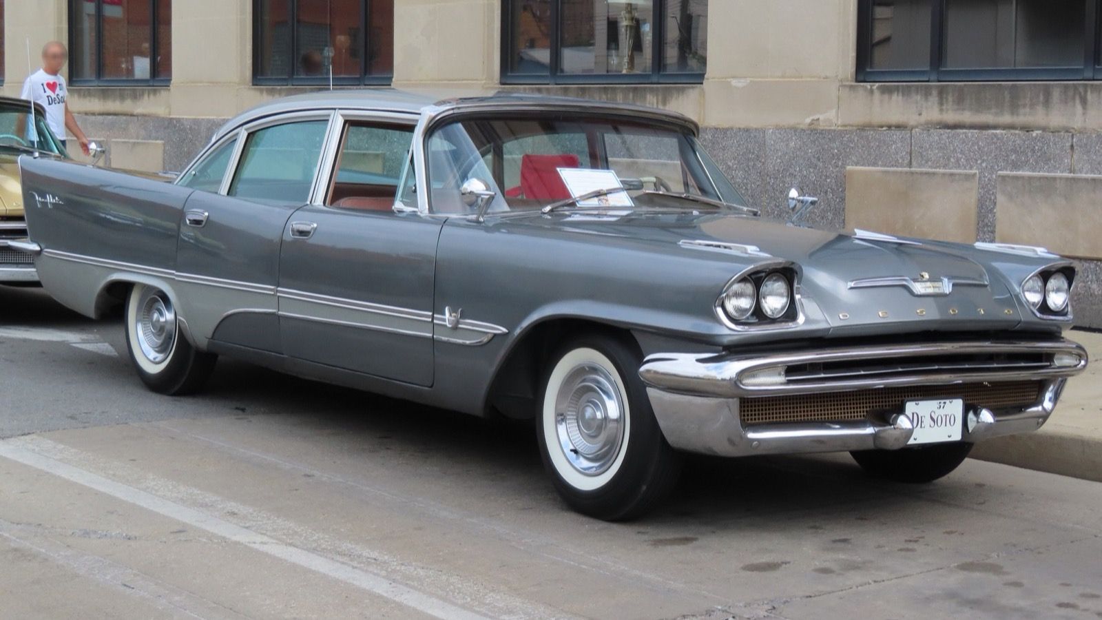Grey 1957 DeSoto Fireflite four-door sedan with tailfins, front three-quarter view