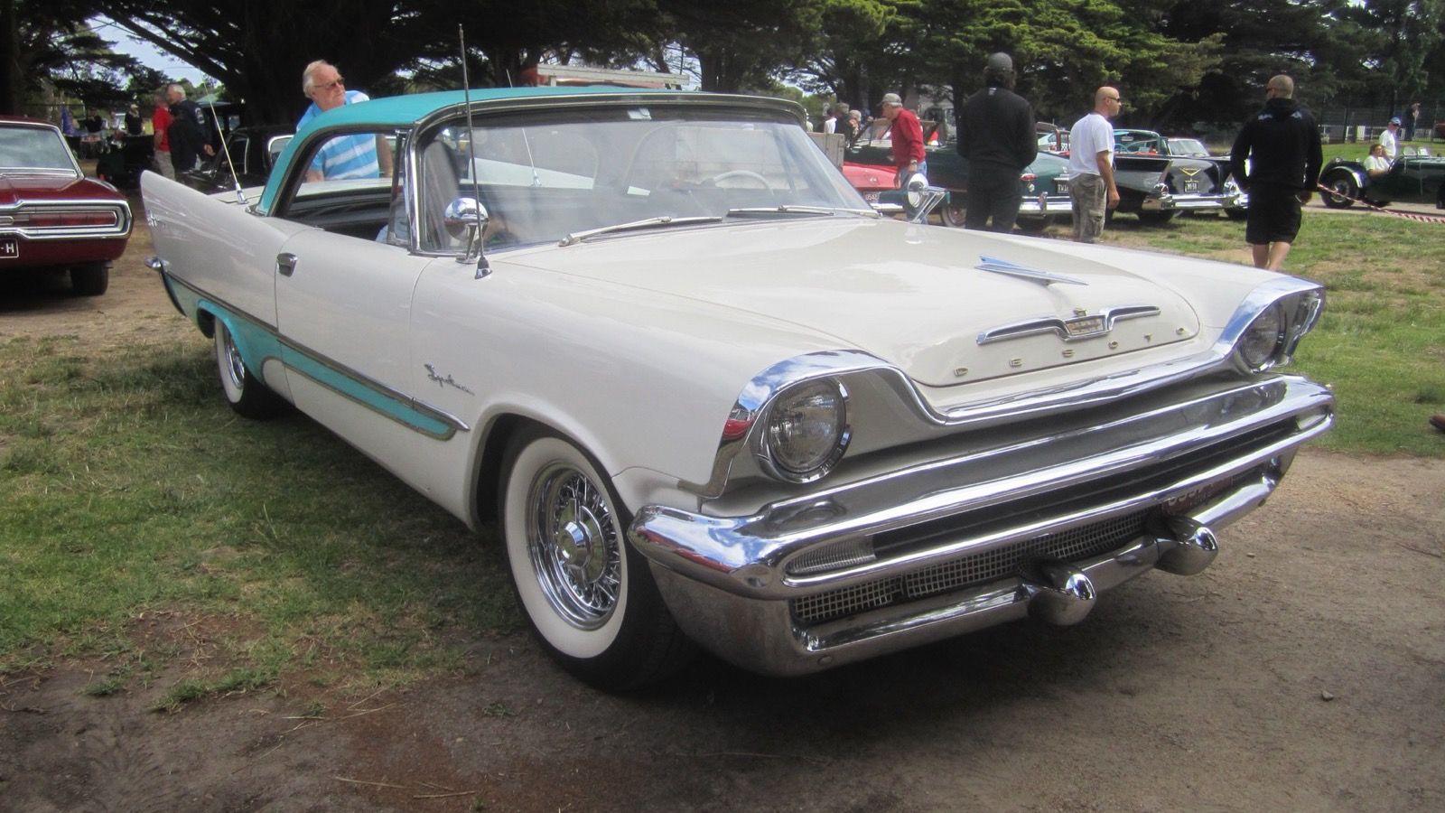 White and turquoise 1957 DeSoto Firesweep Sportsman hardtop, front three-quarter view