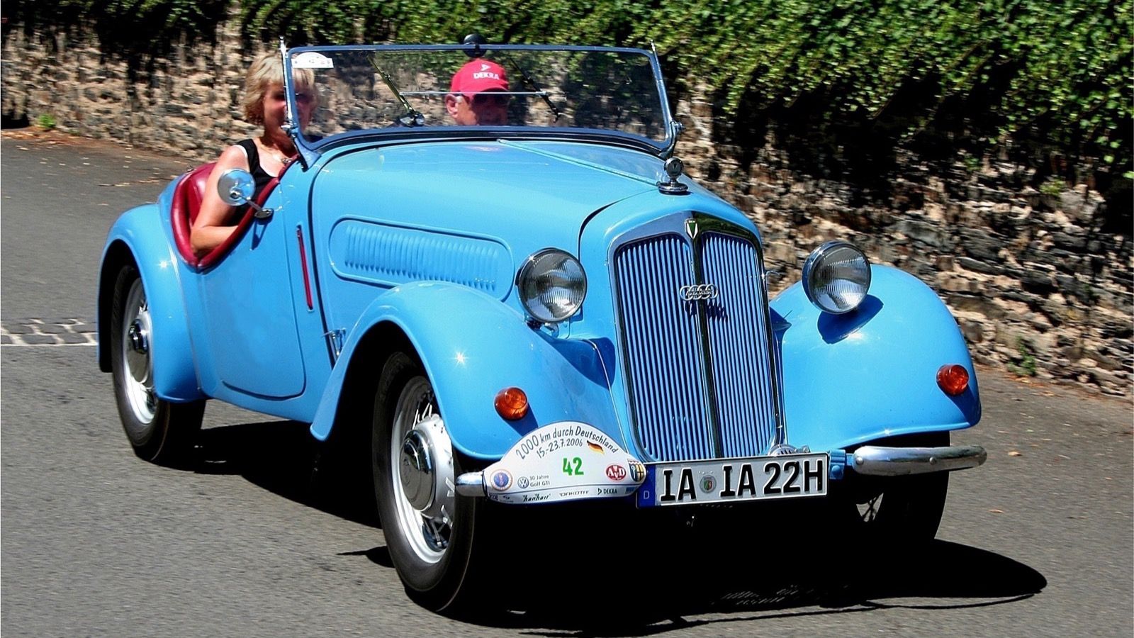 Light blue 1938 DKW F5 Sport-Roadster being driven on a road, front three-quarter view