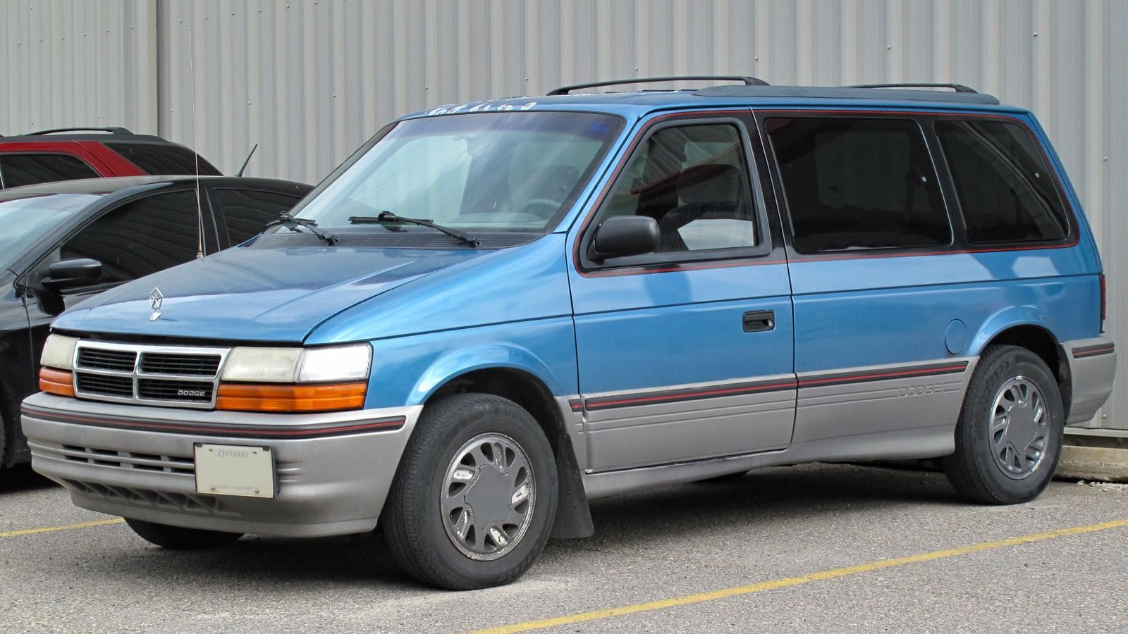 Teal 1992 Dodge Caravan LE minivan, front three-quarter view