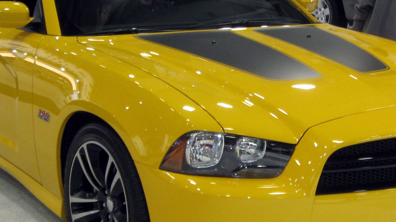 2012 Dodge Charger Super Bee — LD four-door sedan, front three-quarter view