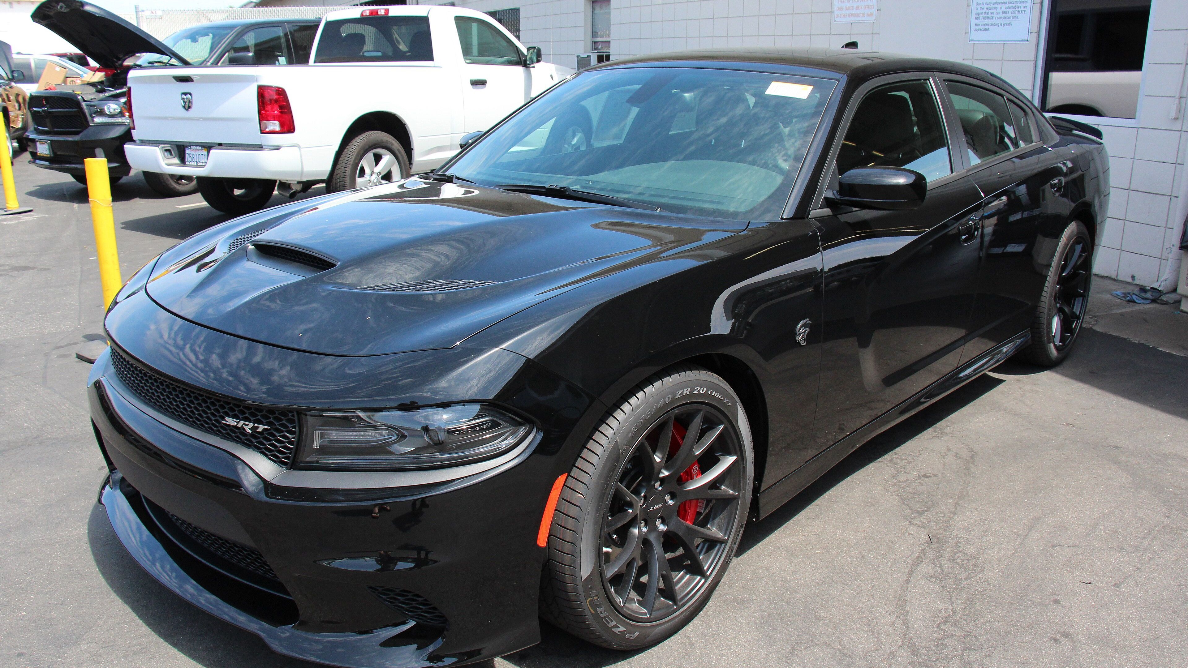 2015 Dodge Charger SRT Hellcat — LD four-door sedan, front three-quarter view