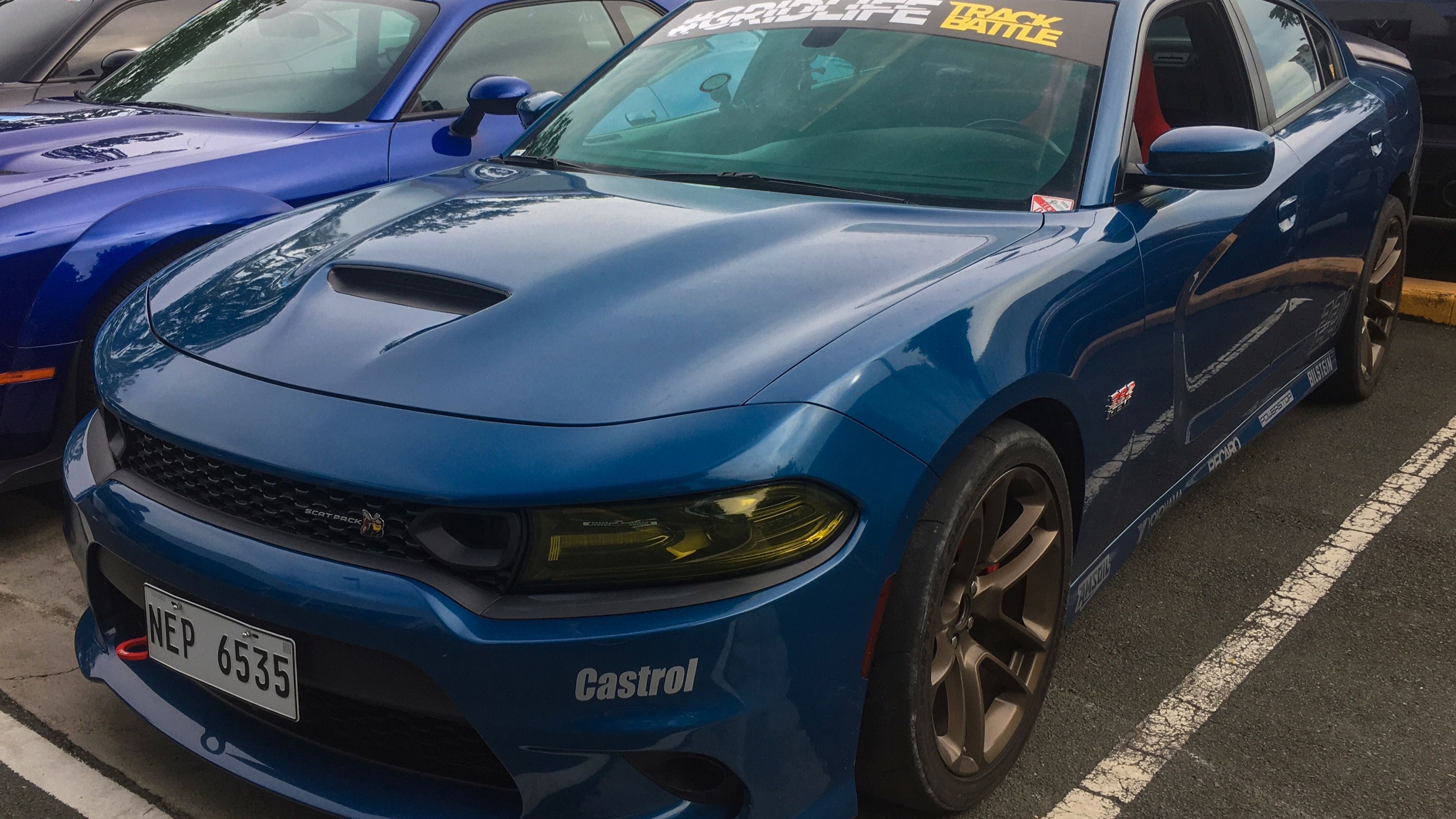 2022 Dodge Charger Scat Pack — LD four-door sedan, front three-quarter view