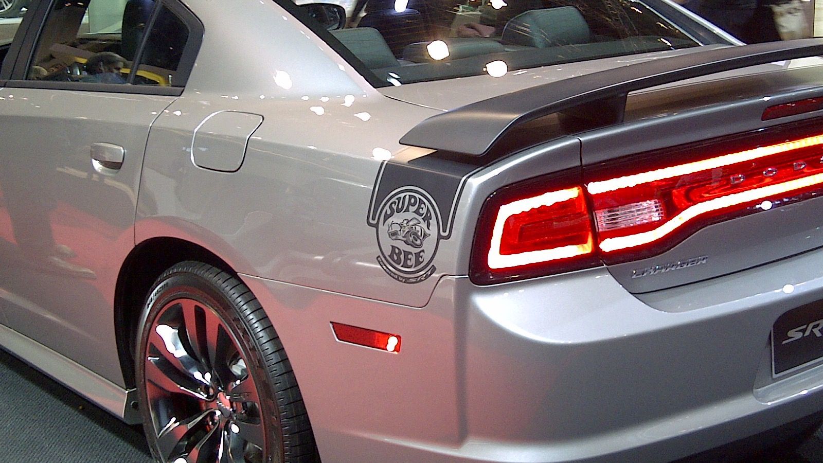 Seventh-generation Dodge Charger — LD SRT four-door sedan, front three-quarter view