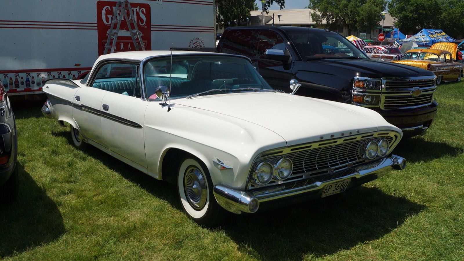 White 1961 Dodge Dart Phoenix hardtop, front three-quarter view