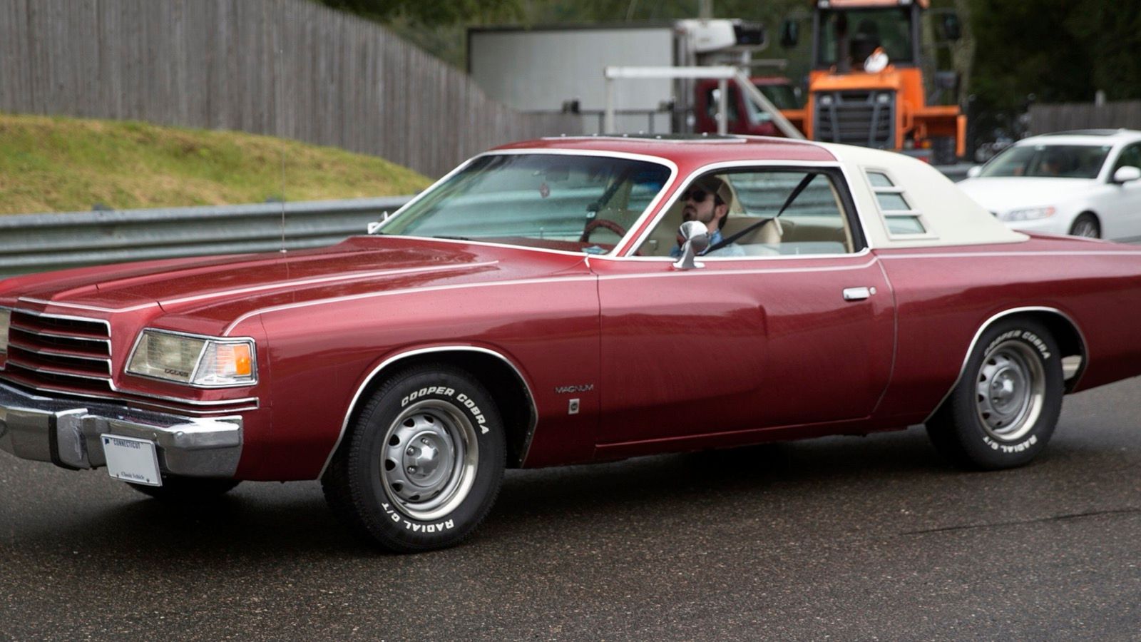 Maroon 1978 Dodge Magnum XE coupe with white vinyl roof, front three-quarter view