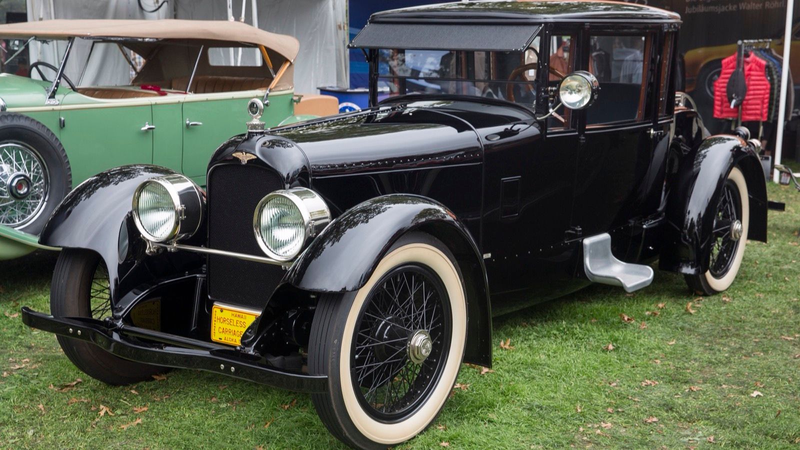 Black 1921 Duesenberg Model A with coachwork by Bender Body, front-left three-quarter view