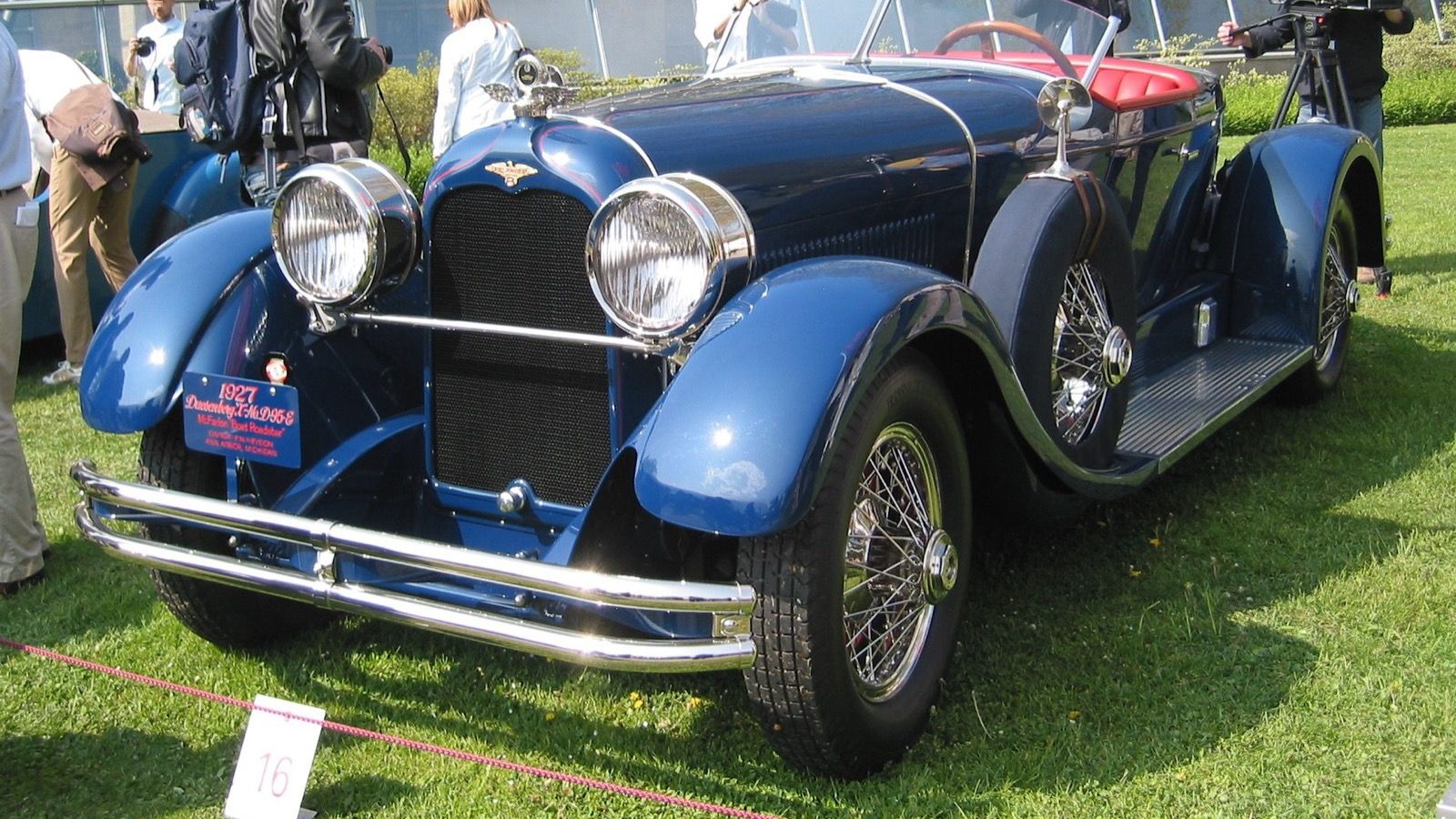 Blue 1927 Duesenberg Model X McFarlan boat-tail roadster, front-left three-quarter view