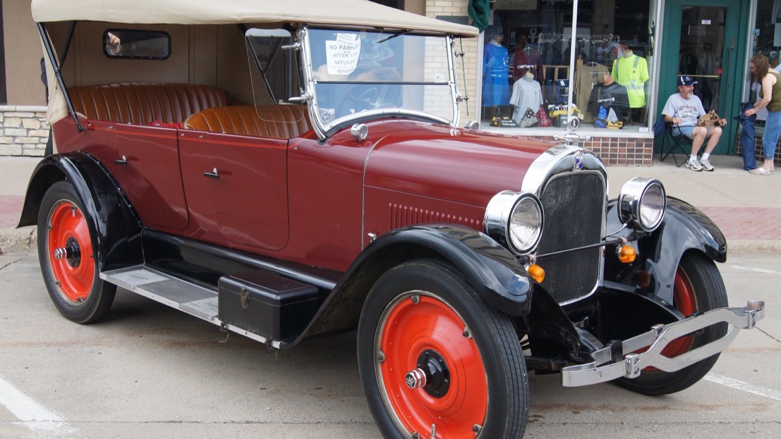 Maroon 1923 Durant A-22 open touring car with folding top raised, front three-quarter view