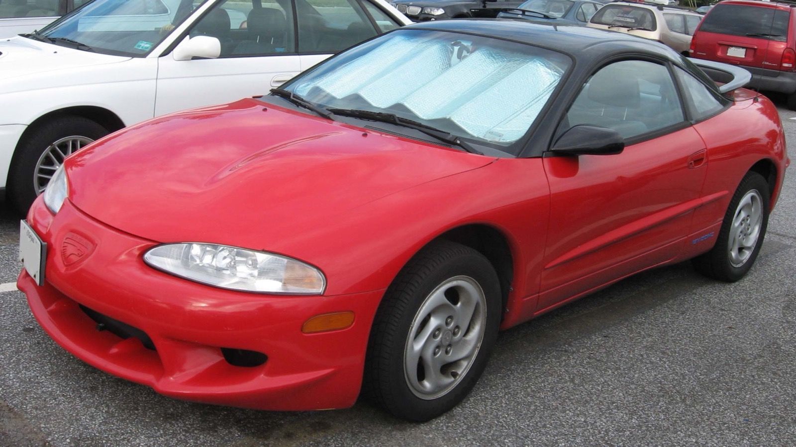 Red second-generation Eagle Talon coupe, front three-quarter view.