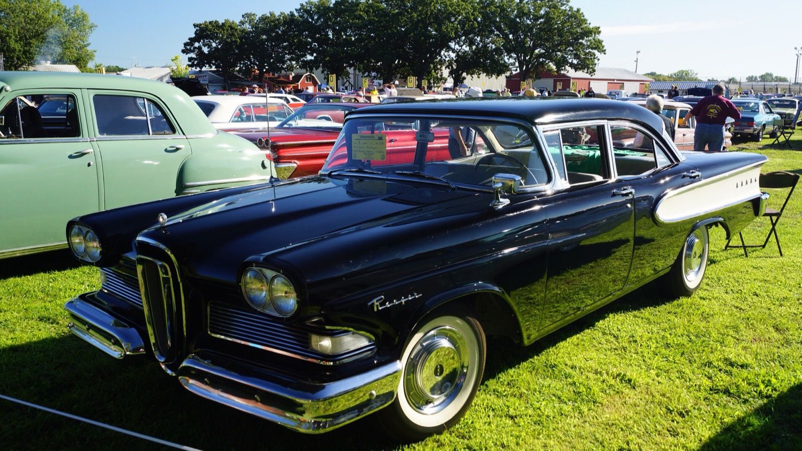 Black 1958 Edsel Ranger sedan, front three-quarter view showing the vertical 'horse-collar' grille