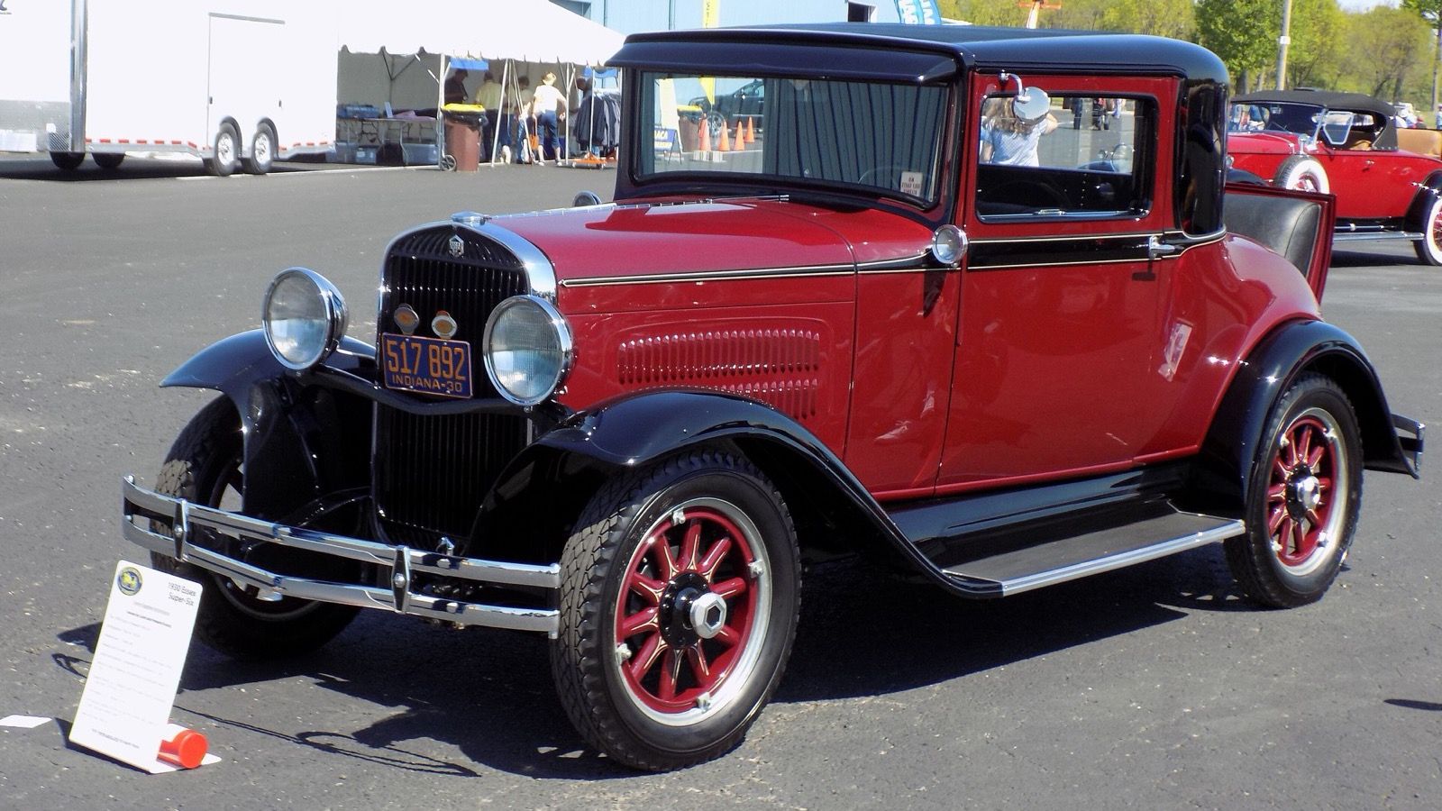 Red and black 1930 Essex Super-Six coupe at a car show, front three-quarter view