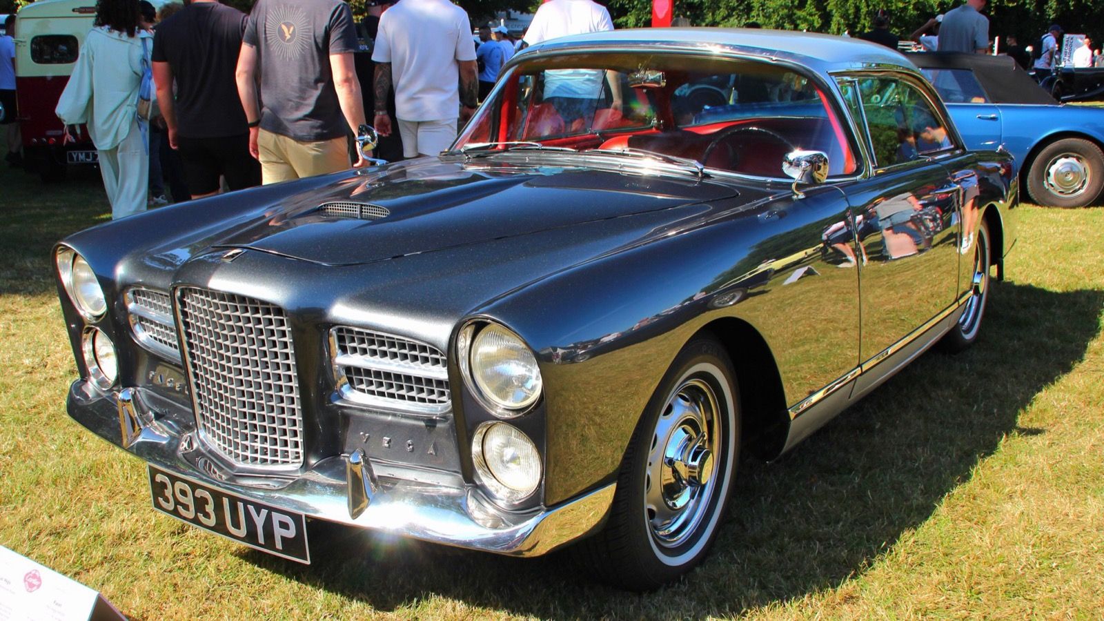 Dark grey 1961 Facel Vega HK500 coupé on grass, front three-quarter view