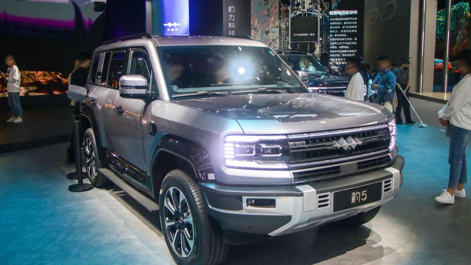 Grey Fang Cheng Bao Bao 5 PHEV SUV on a show stand, front three-quarter view