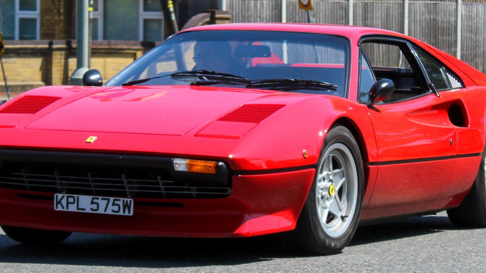 Red 1980 Ferrari 308 GTB, front three-quarter view