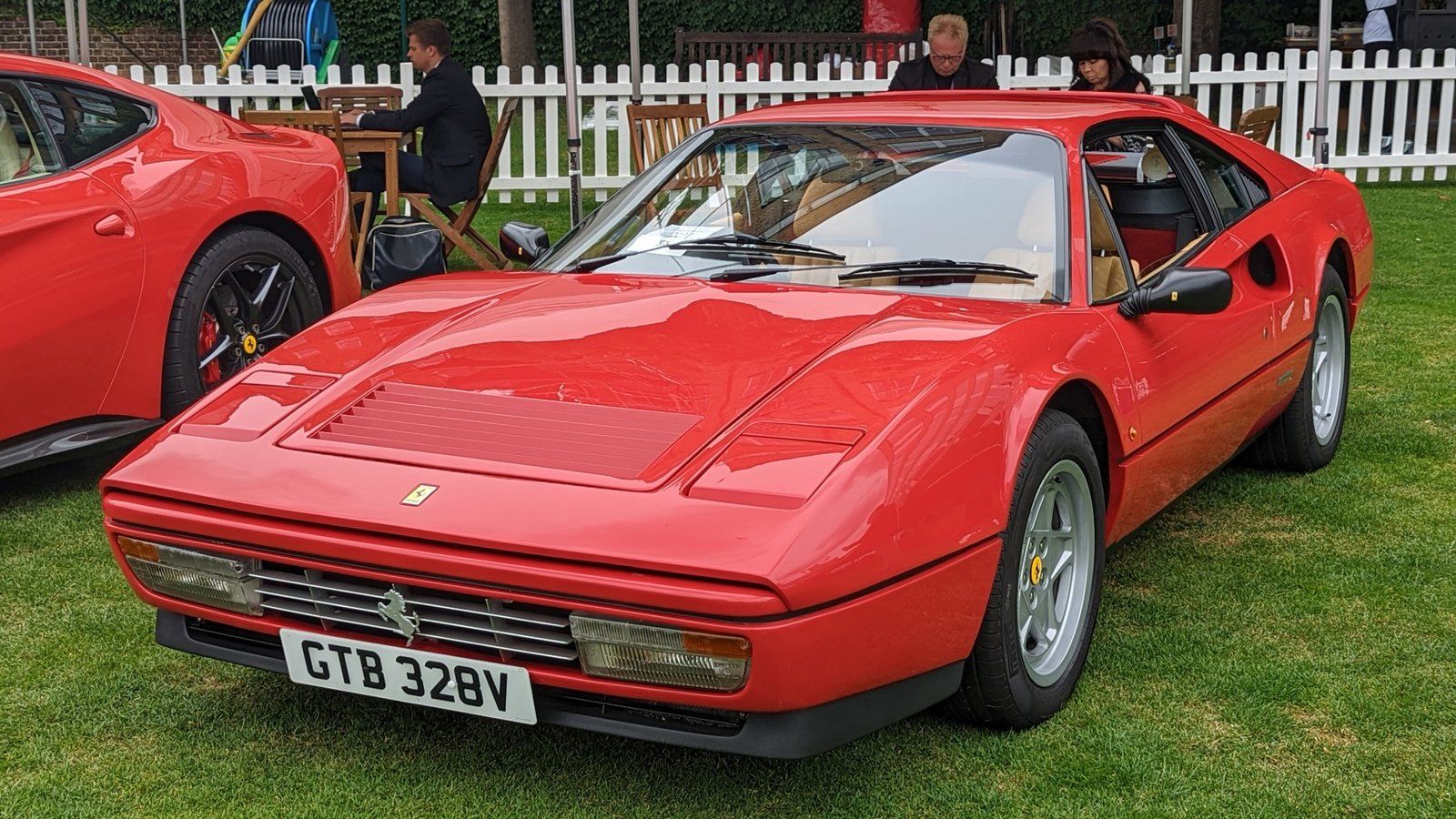 Red 1986 Ferrari 328 GTS targa, front three-quarter view