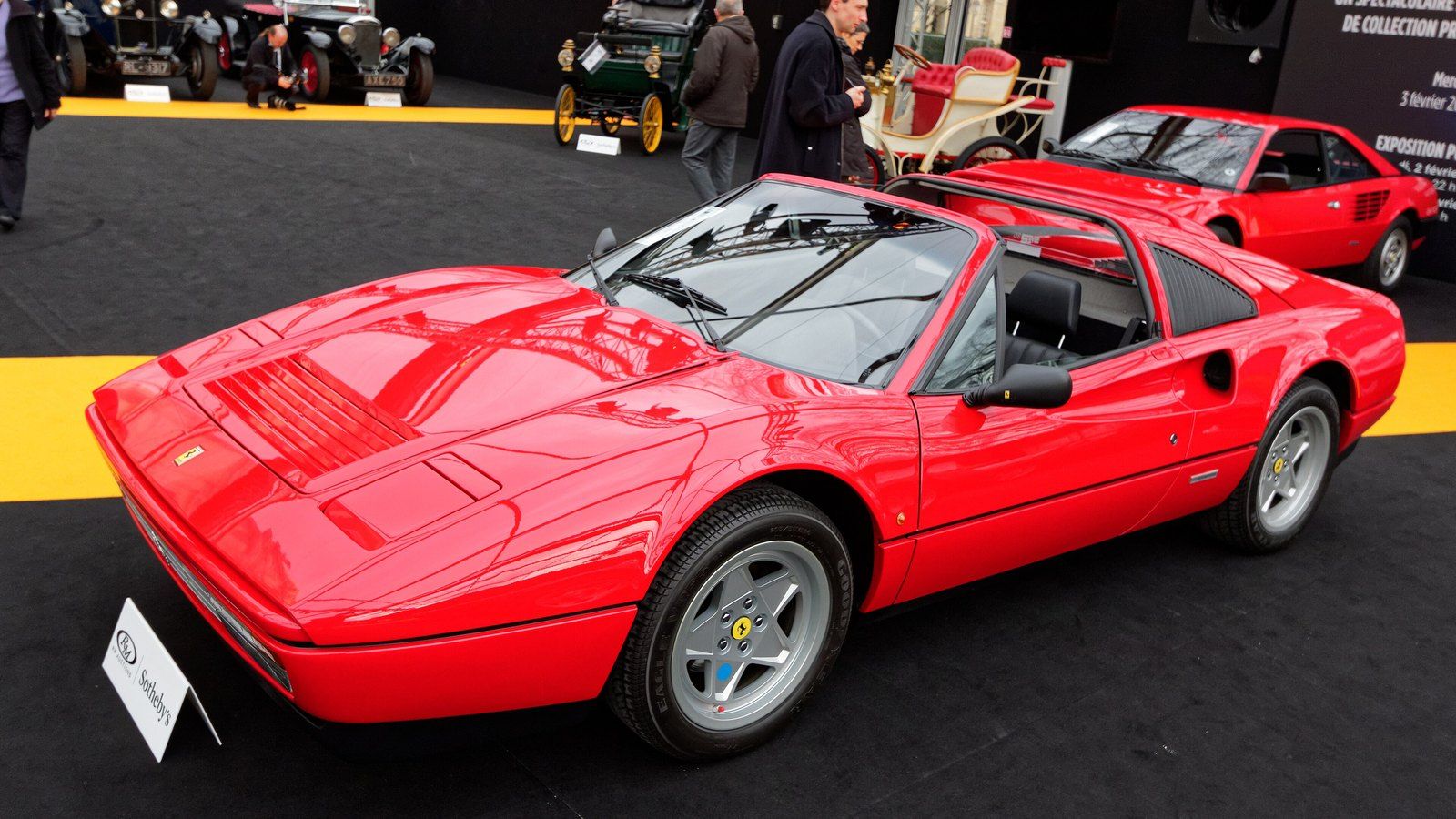 Red 1988 Ferrari 328 GTS targa at auction, front three-quarter view