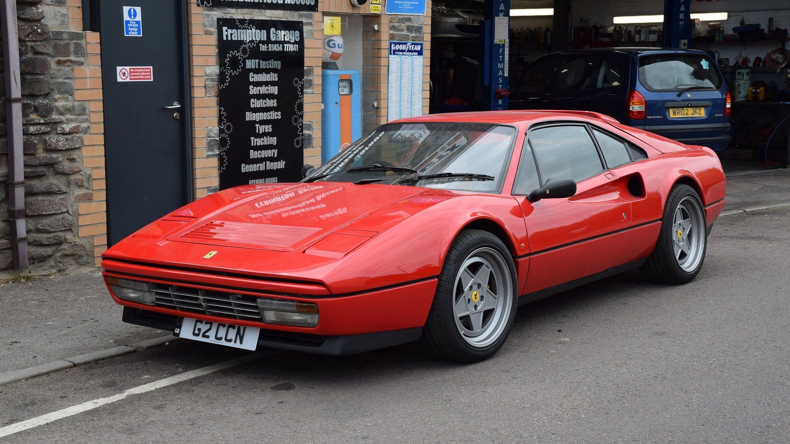 Red 1989 Ferrari 328 GTB coupé, front three-quarter view