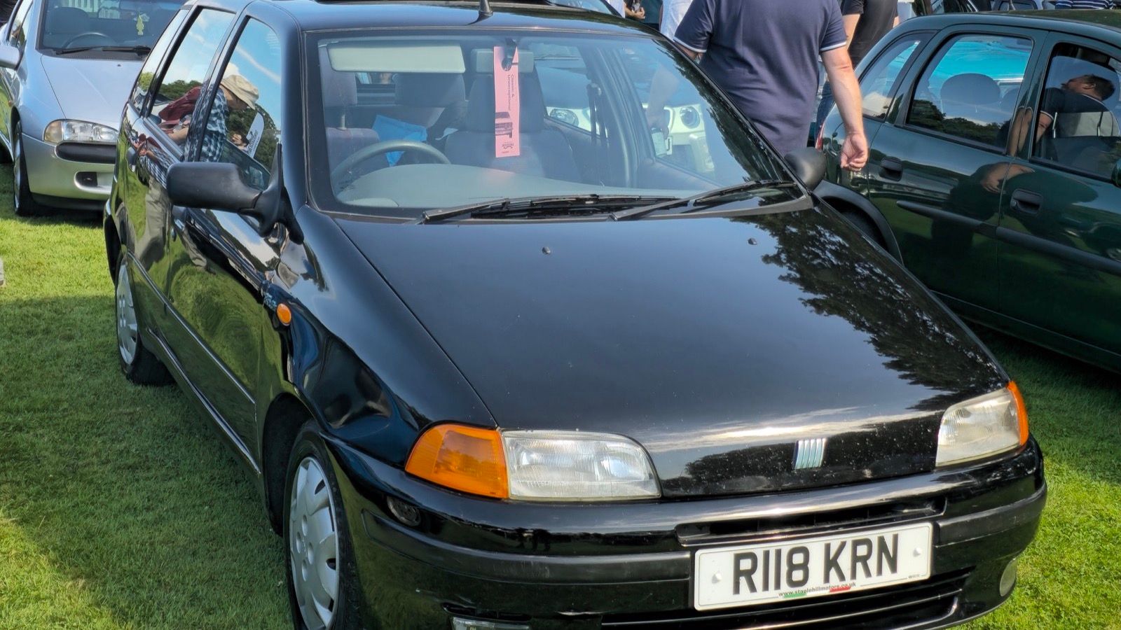 Black 1998 Fiat Punto SX 85 five-door, front three-quarter view