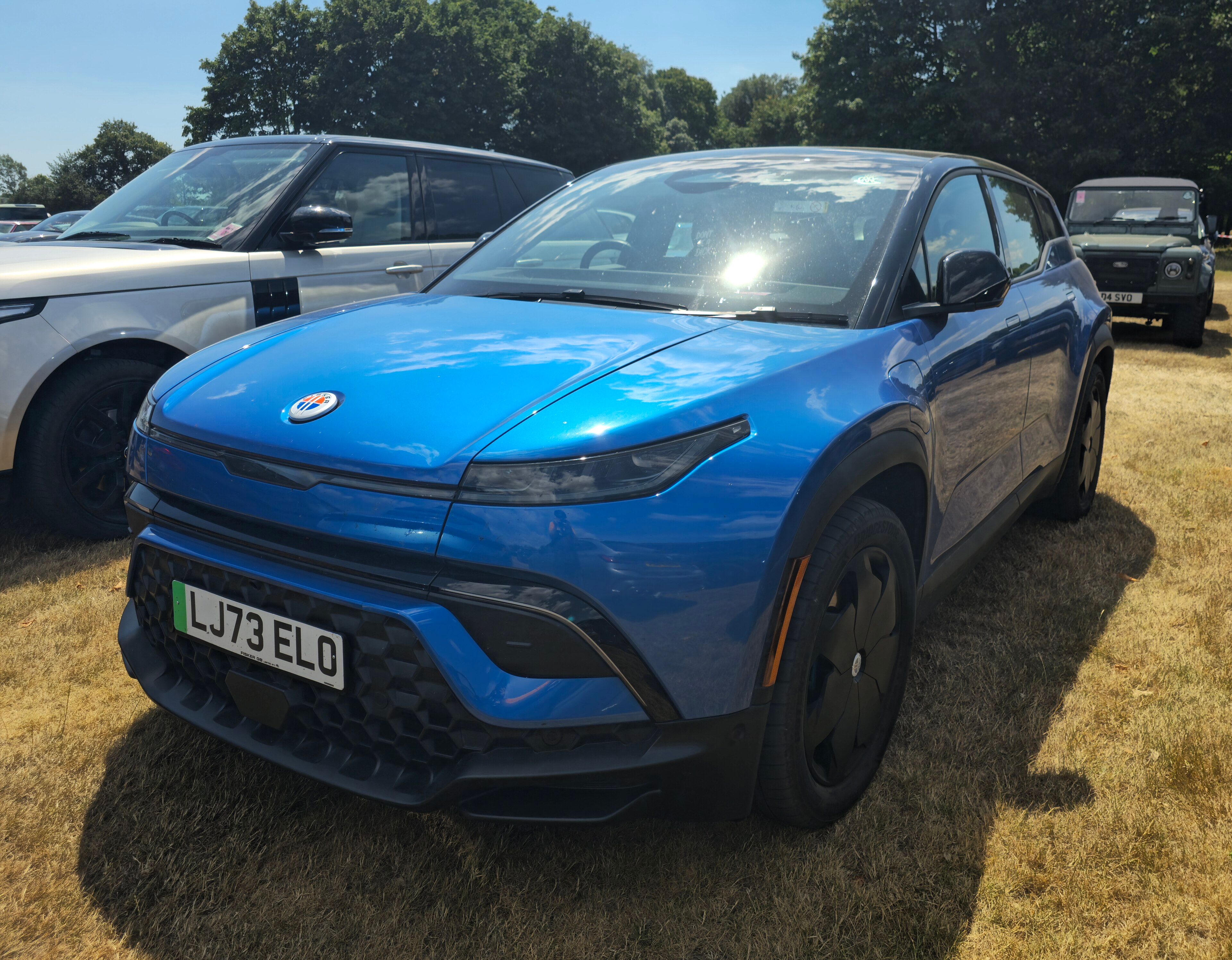 Blue 2024 Fisker Ocean Extreme electric SUV, front three-quarter view