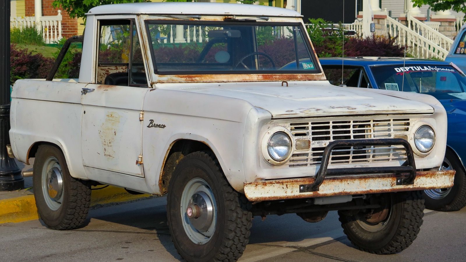 1968 Ford Bronco pickup, first-generation compact 4x4 — Wimbledon White, front three-quarter view