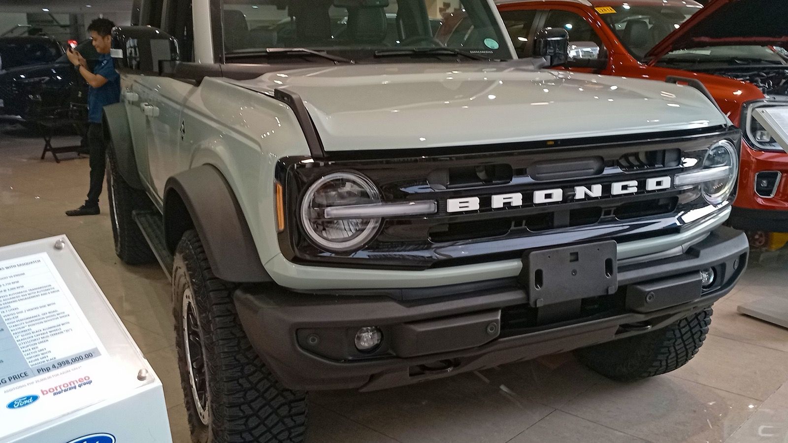 2024 Ford Bronco Outer Banks with Sasquatch Package in Cactus Gray — front three-quarter view