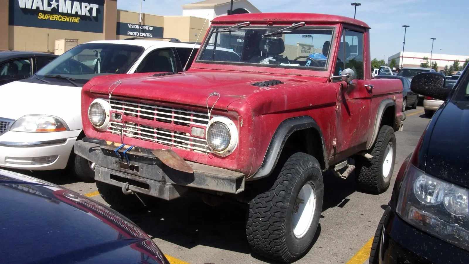 1966 Ford Bronco, first-generation compact 4x4 — white, front three-quarter view